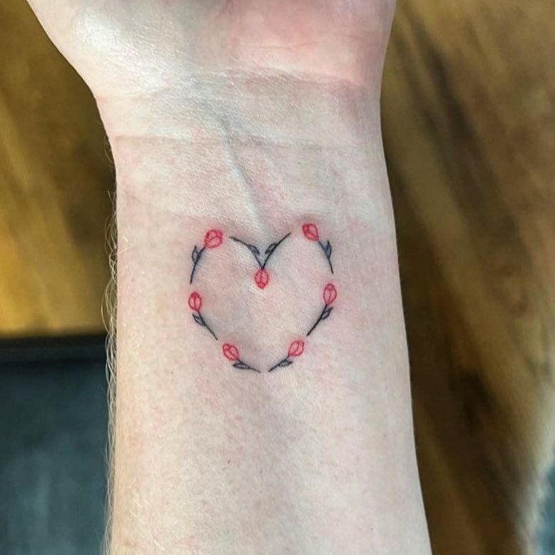 @amyduranstudios made this adorable tulip tattoo. She&rsquo;ll booking for May soon! #finelinetattoo #hearttattoo #tinytattoo #hearttattoo #athensgatattooartist #athensgacreatives #athensga #atltattooartist #cosmetictattooing