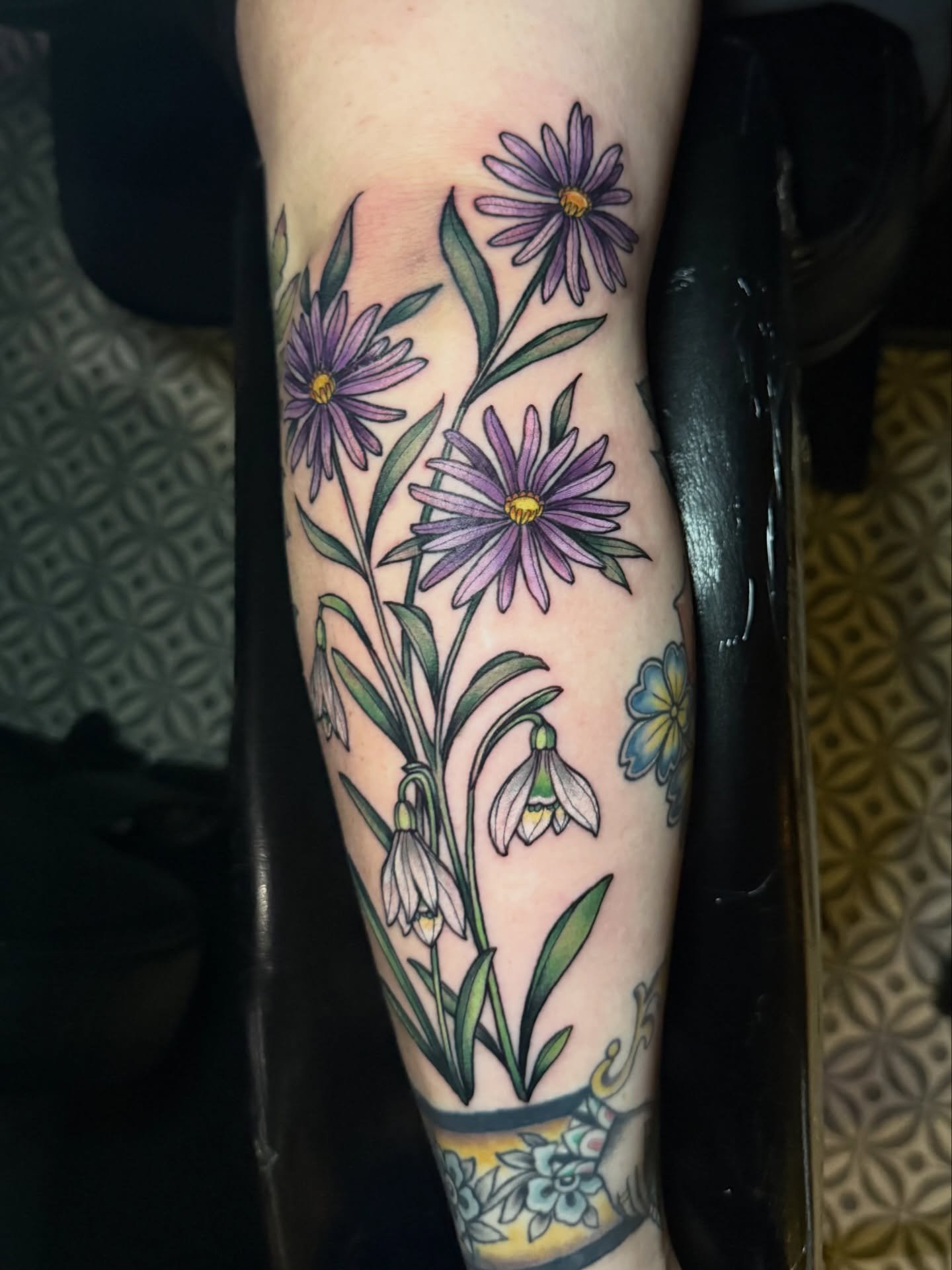 Some neotrad florals for one of my fave clients. Thanks, babe! Books are open for Spring. I&rsquo;d love to do more floral or botanical tattoos. They&rsquo;re my fave! #neotradtattoo #snowdrop #asters #birthflowertattoo #athensgatattooartist