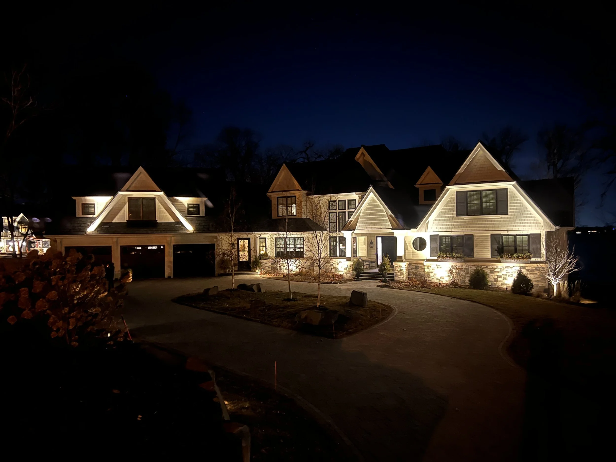 MB Landscapes installed ground lights to illuminate a customers home.