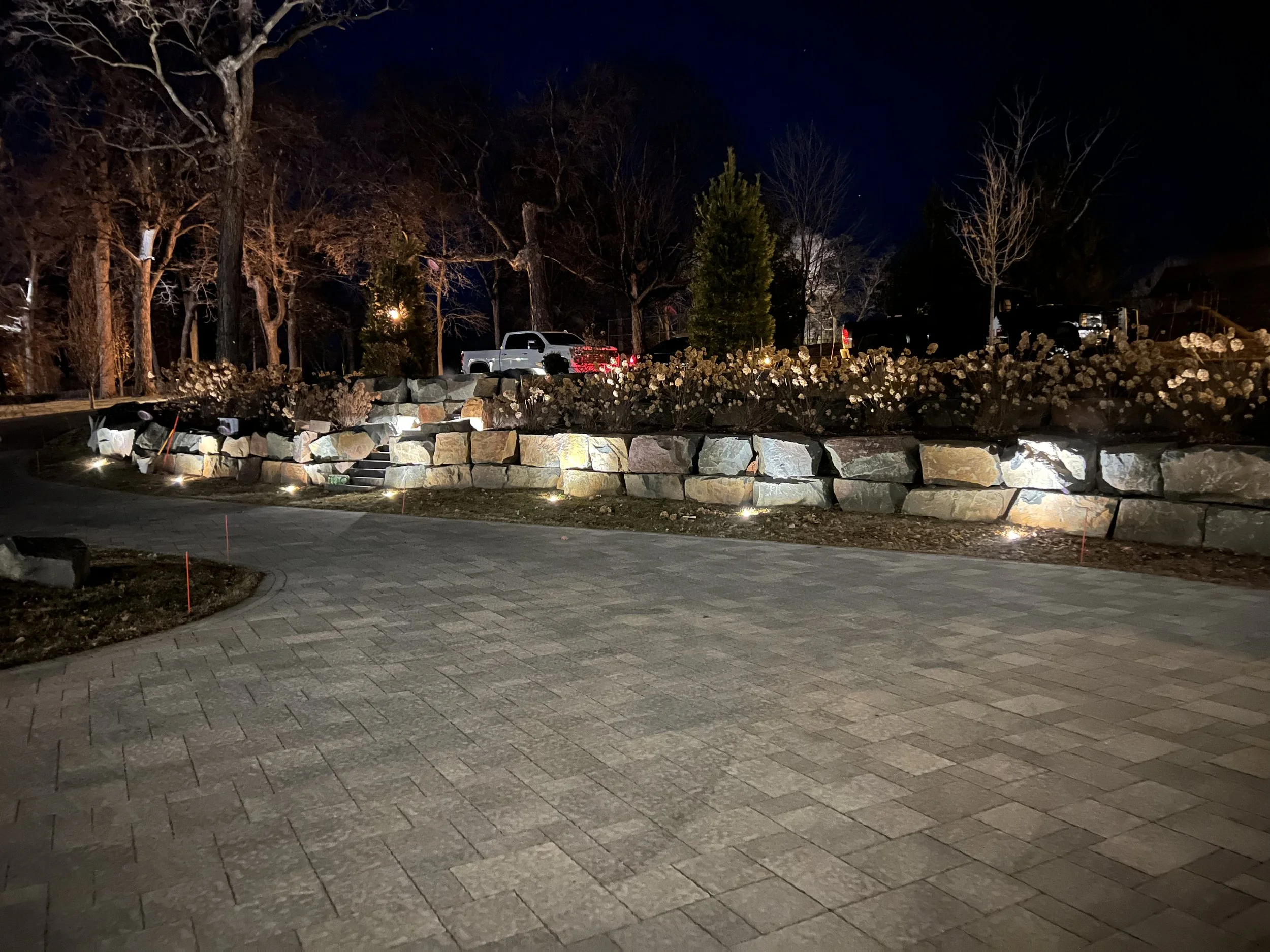 MB Landscapes installed ground lights to illuminate a customers home.