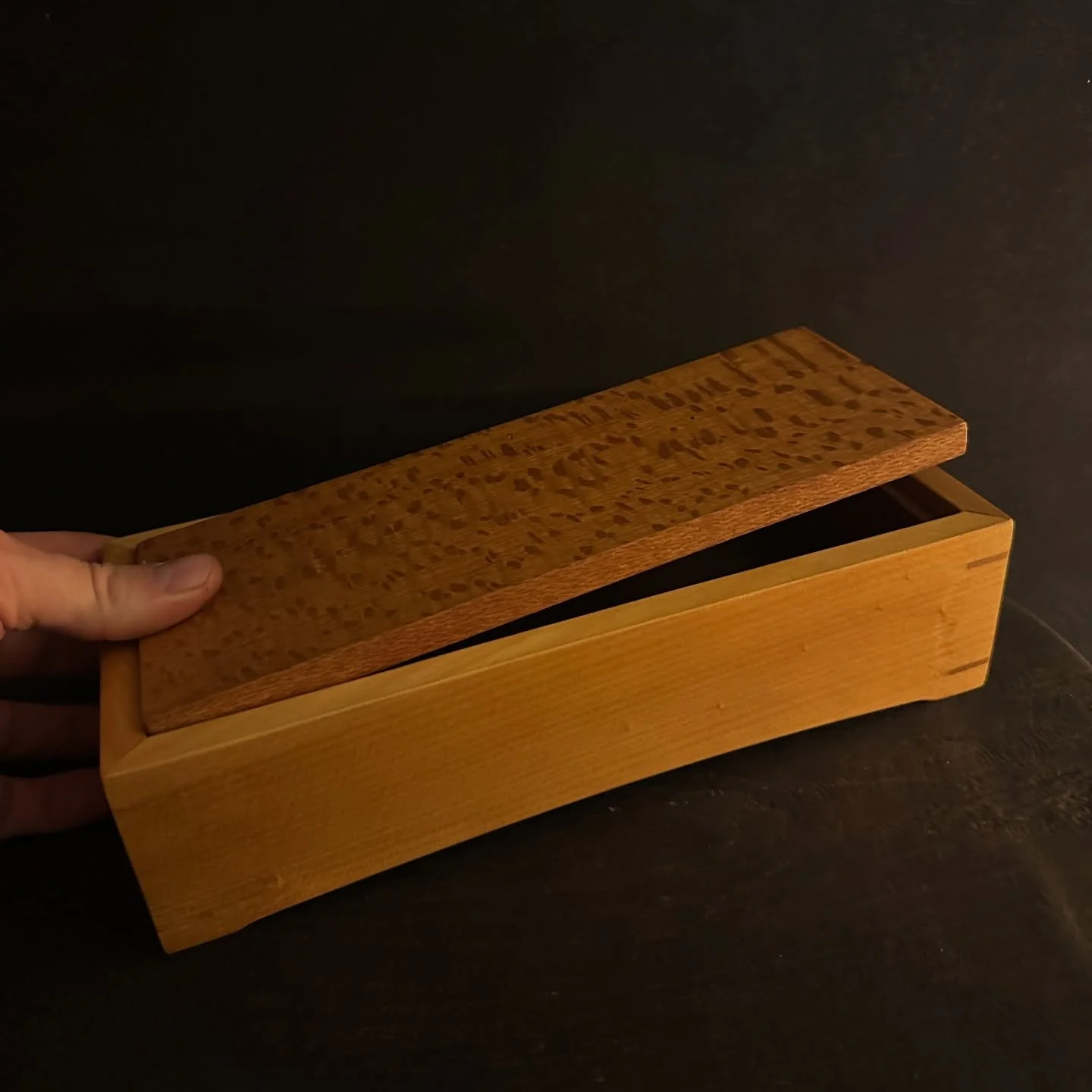 This recycled hoop pine and silky oak box from Robert Perry has a simple and effective opening mechanism!

A press of the finger simply opens the box up, find well made &amp; heirloom quality boxes like this one at ourlittleshed.com!