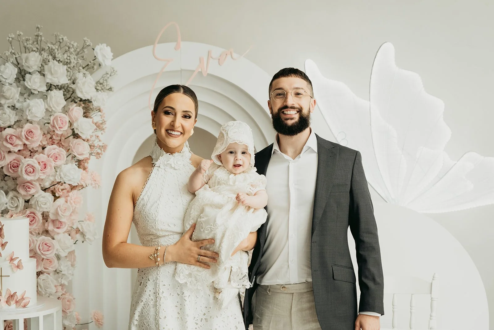 Child in Christening Dress with Parents at Vanilla Oakleigh Melbourne Baptism Venue