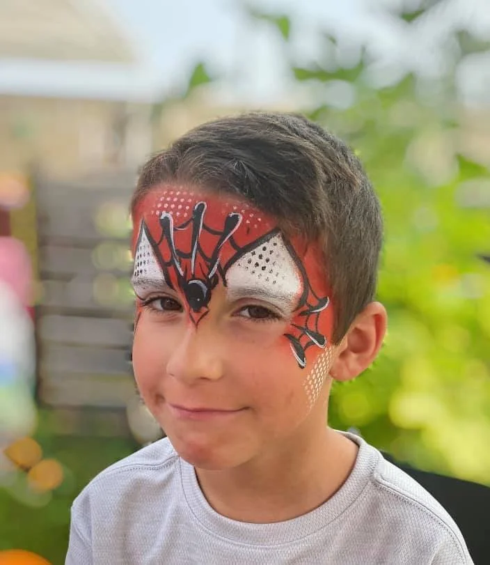 Kids spider man face painting design by Magic Pixie Entertainment in Edmonton