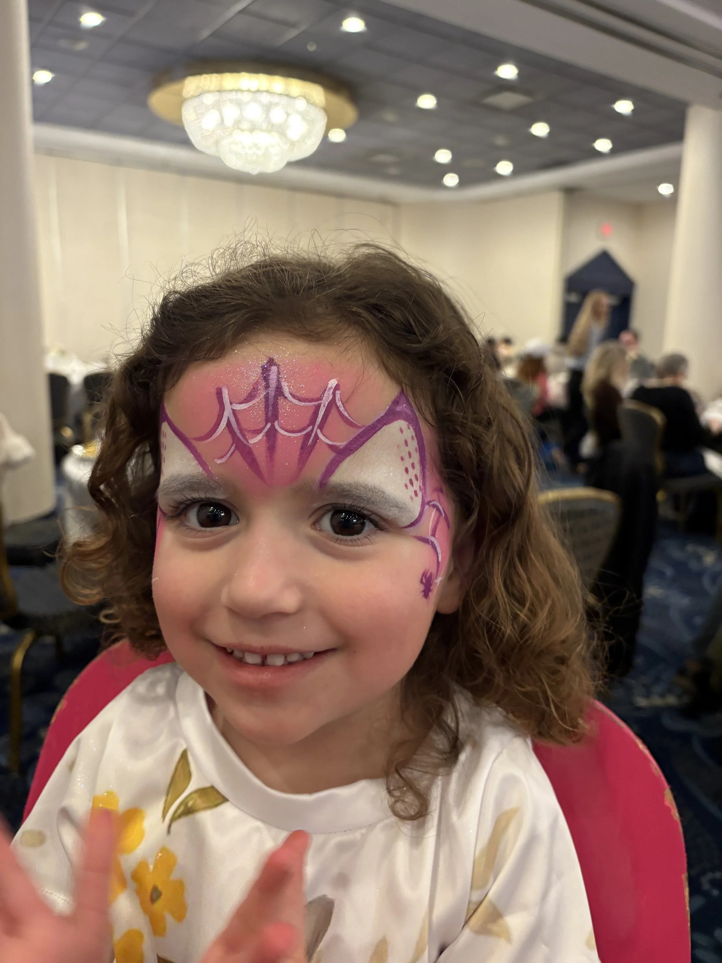 Professional face painting station with safe, hygienic paints in Alberta