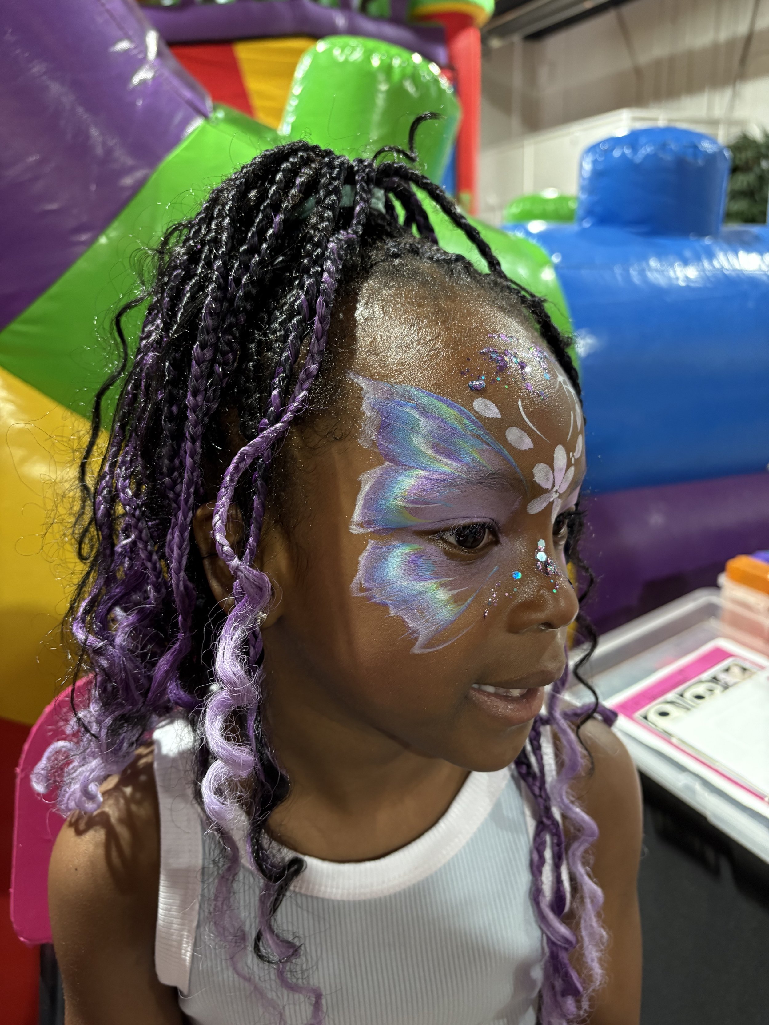 Sparkly butterfly face paint for birthday parties in St. Albert