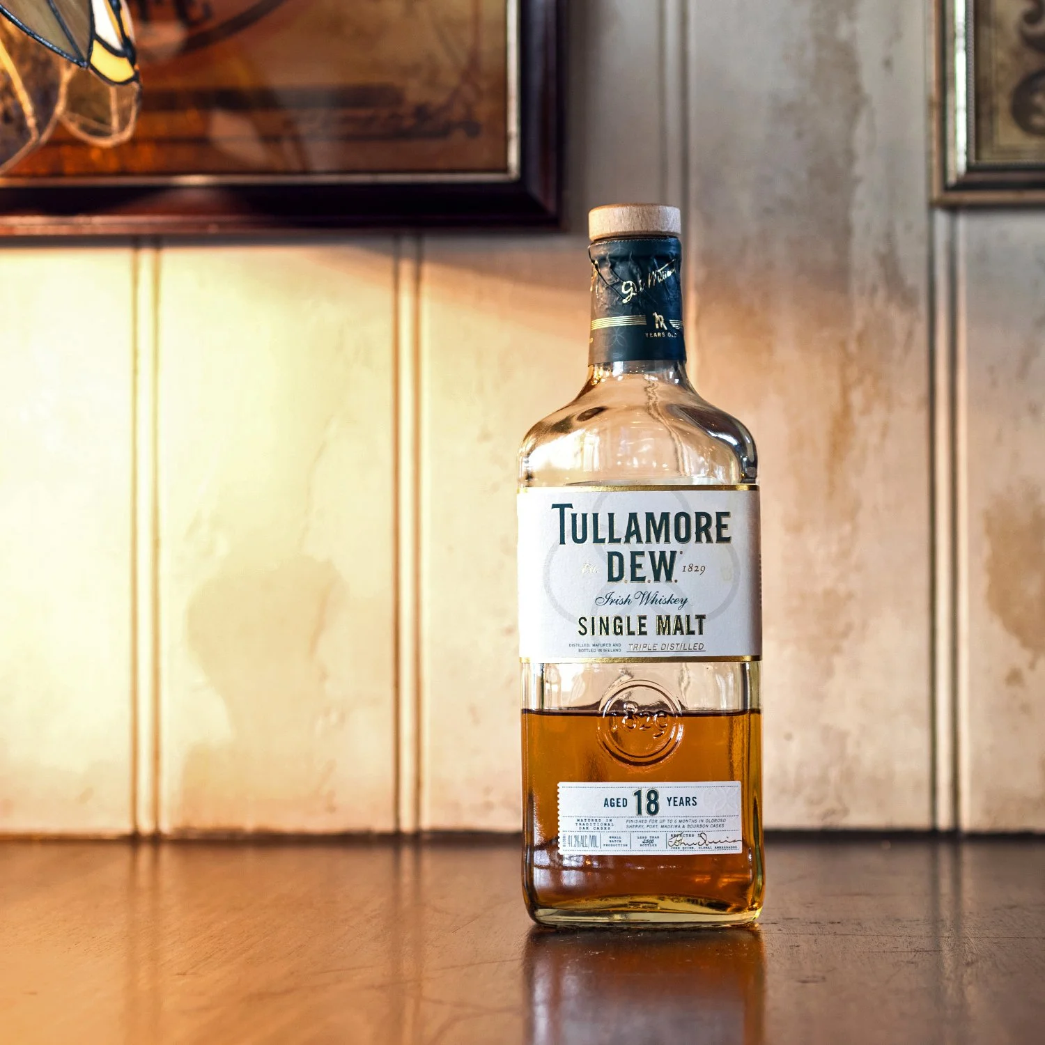 glass whiskey bottle of tullamore 18 year old
