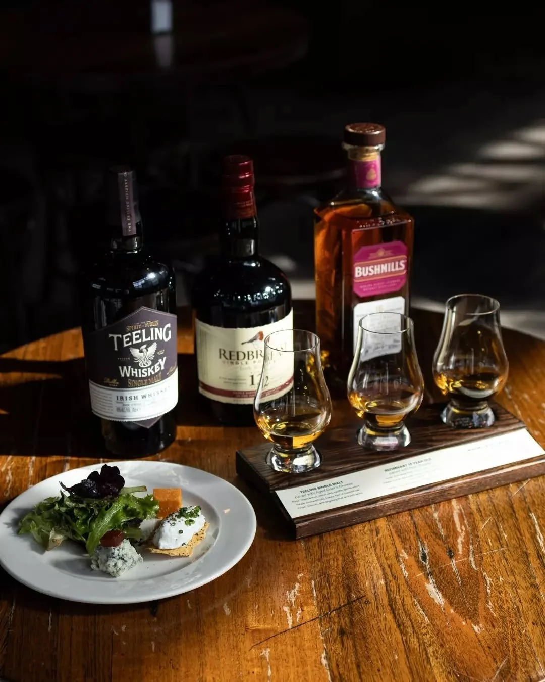 Father's Day whiskey &amp; cheese flight&mdash;Teeling Single Malt with aged goat's cheese. Redbreast 12 paired with sharp cheddar. Bushmills 16 alongside Cashel blue.

Tables disappear fast for Father's Day. Book now, thank yourself later.
