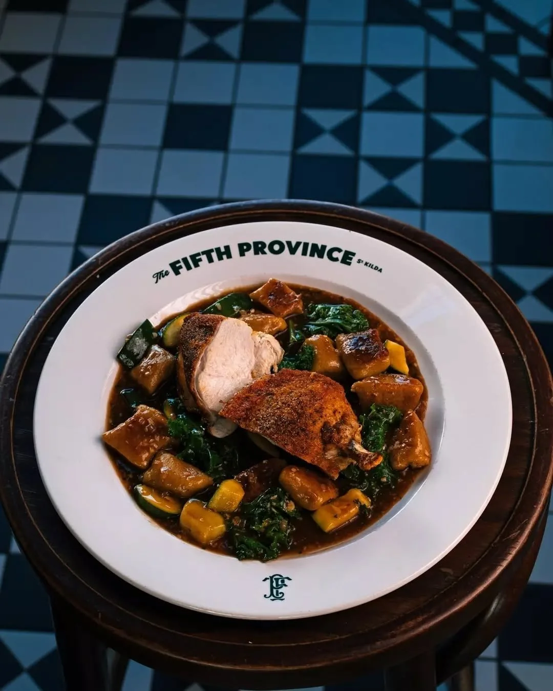 Pan roasted chicken breast on house-made gnocchi with kale, zucchini and a shallot thyme jus&mdash;light enough for summer, satisfying enough to stay for another round.