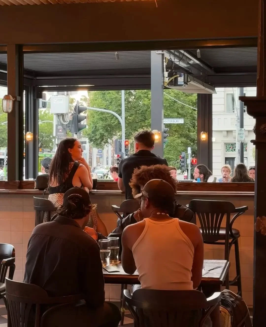 Golden hour on the verandah. Drinks in hand, nowhere else to be.