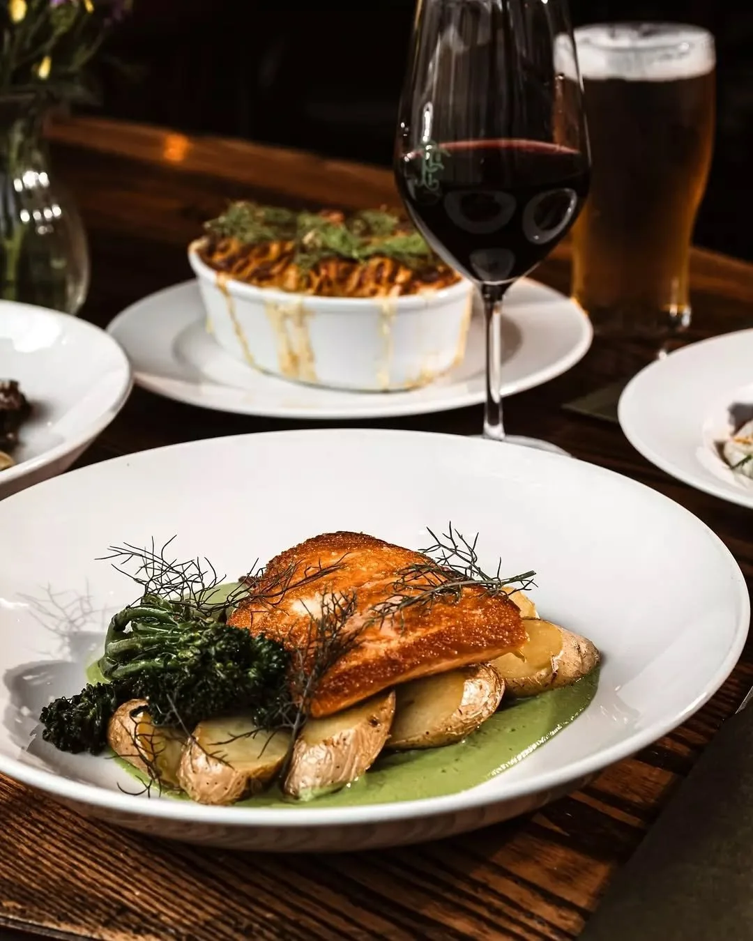 Pan-seared salmon.

Pea puree, confit kipfler potatoes, fennel, broccolini. 

Rich, steady, proper comfort. The kind of dish that holds its own.

The Fifth Province. For whatever the craic may be.