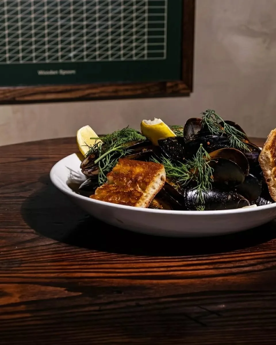 Steamed local mussels. 'Nduja spiced white wine broth, toasted baguette. 

Our iconic mussels have made their way back onto the menu for the cooler months &mdash; when they're at their best.