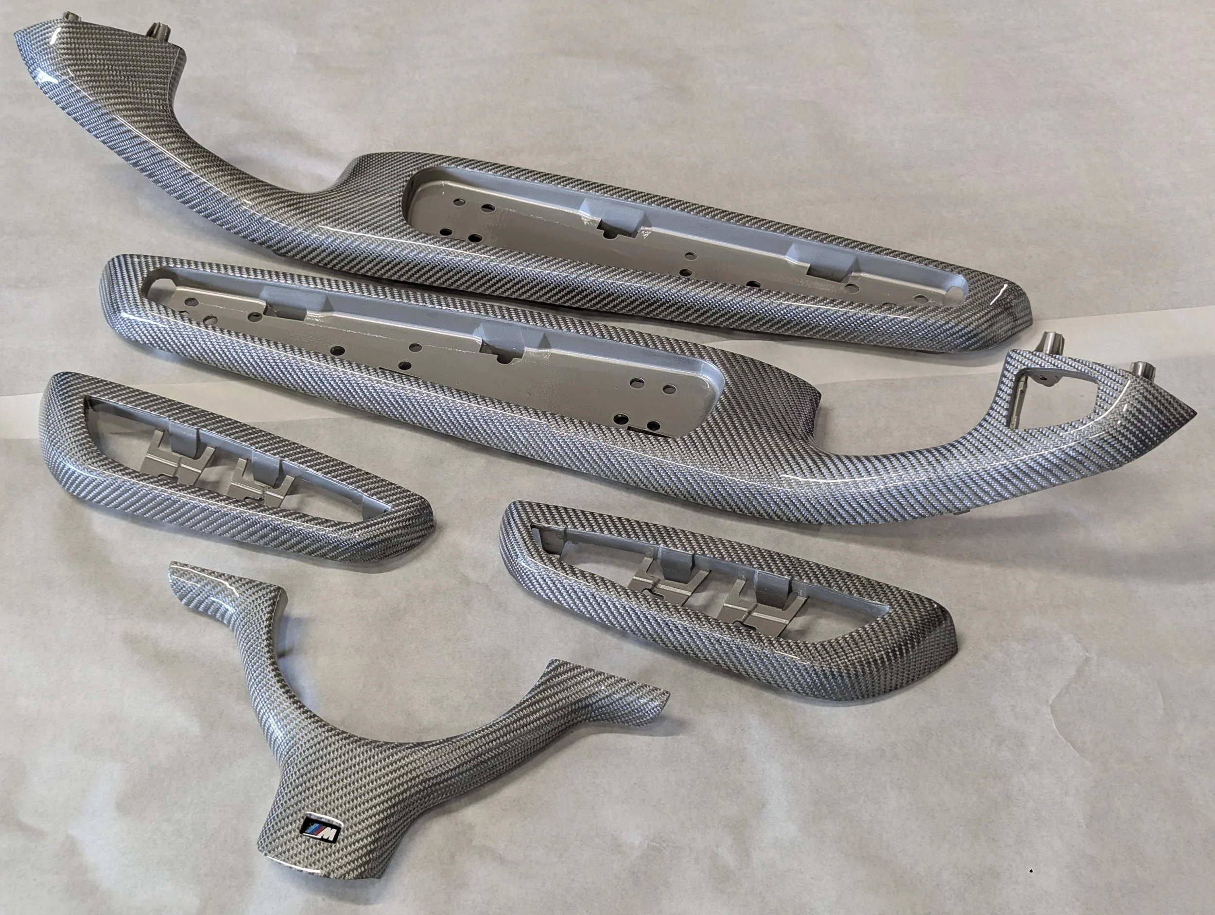 Custom skinned silver carbon fiber BMW interior trim