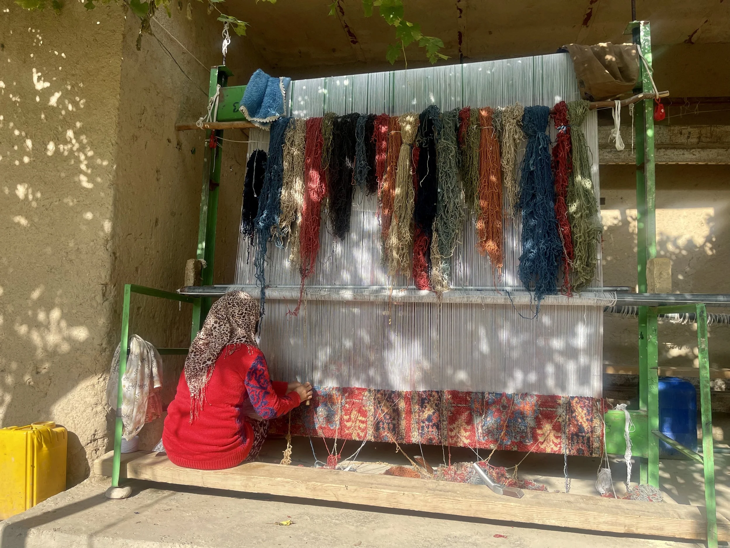 Women doing carpet waving in Balkh city.jpeg