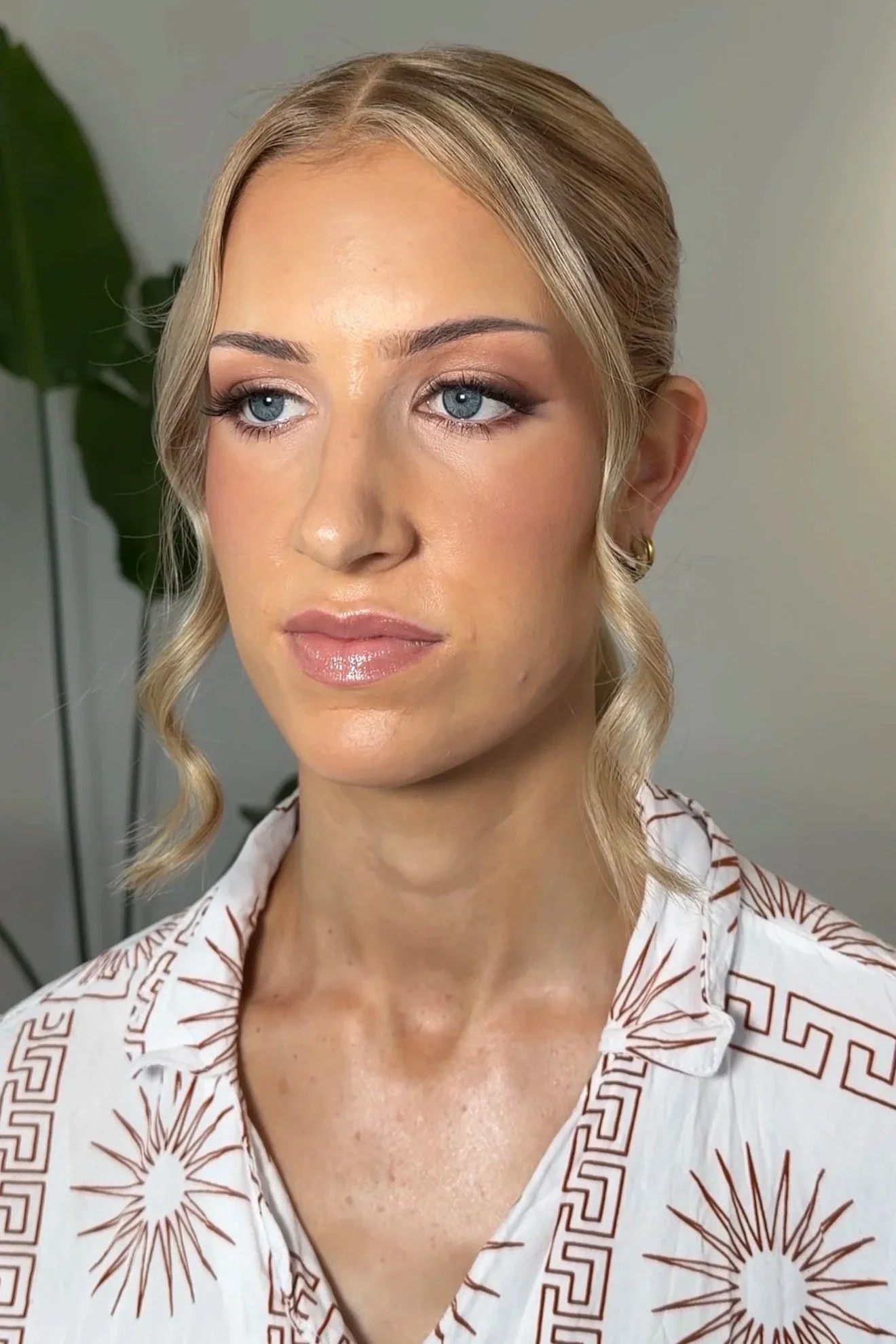 engagement party soft glam makeup look smokey wing and shimmer eyeshadow glowing skin