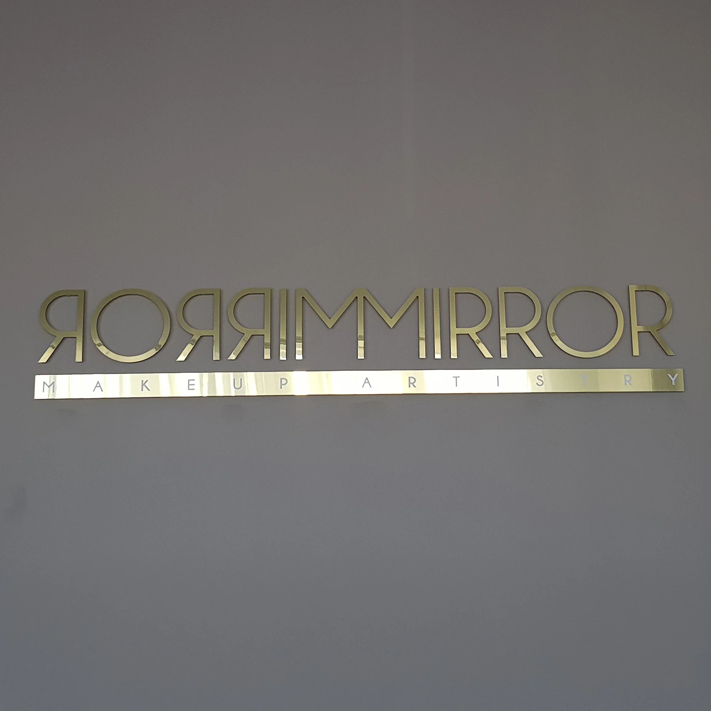 Gold+cut+wall+sign.webp
