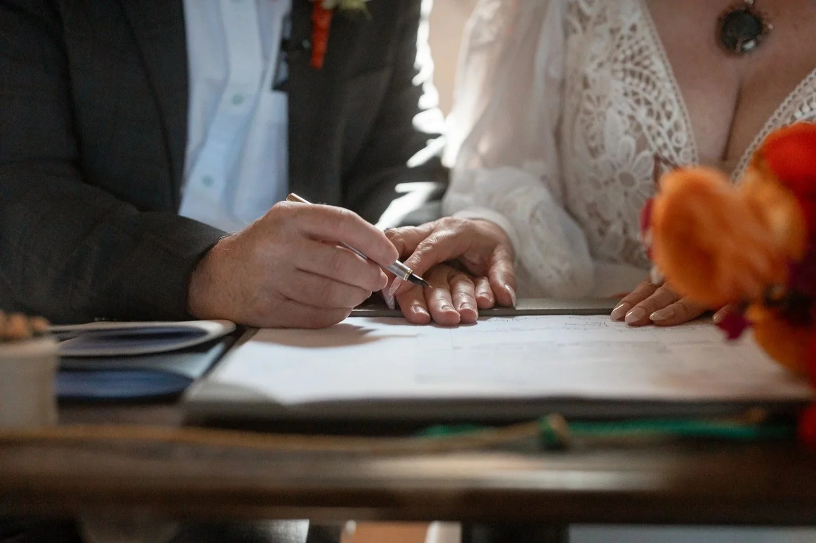 Couple signing the register