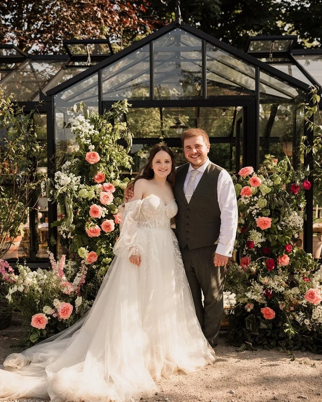 Wedding couple outside the Glasshouse