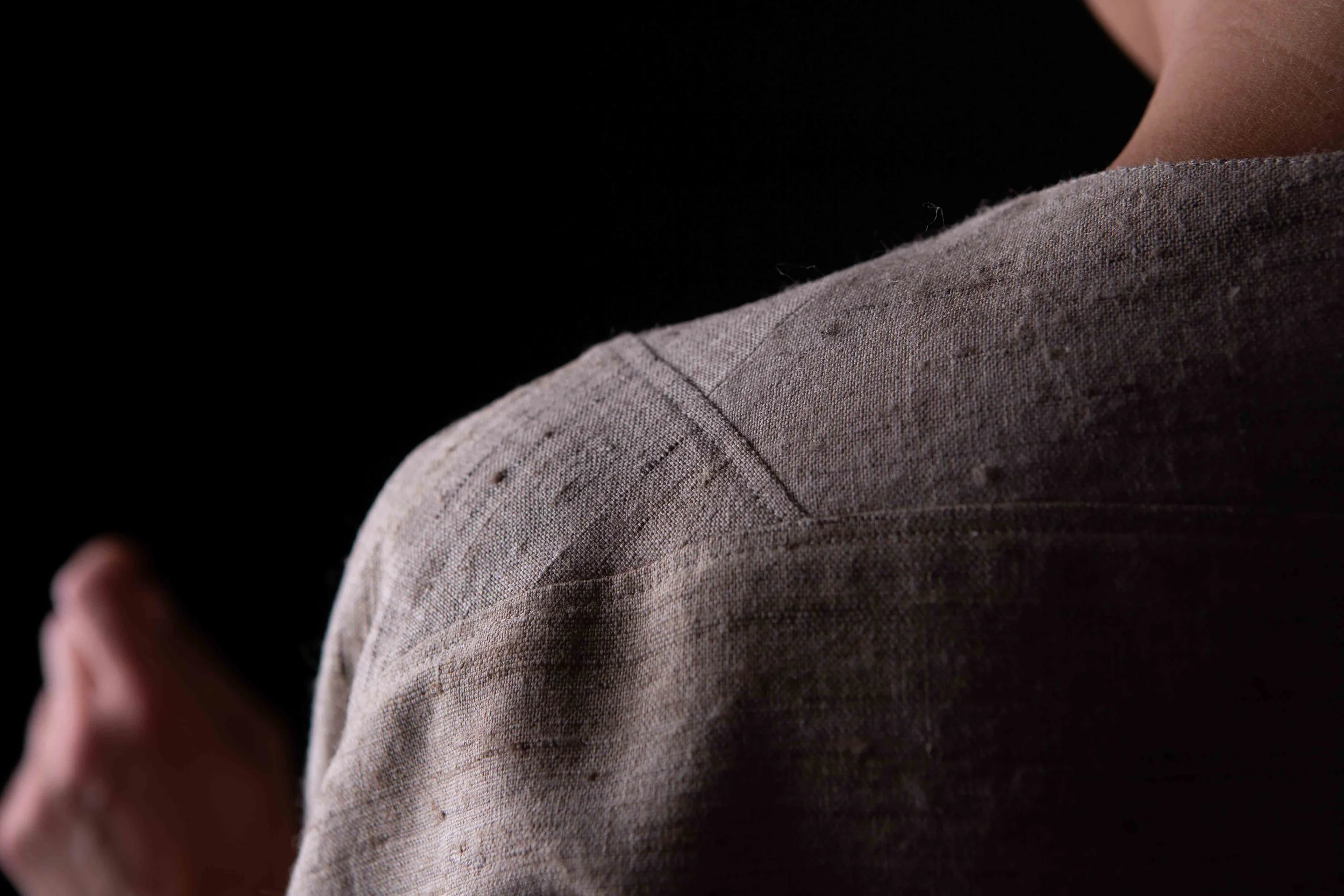 Detail of the duster jacket in vibrant matka silk fabric