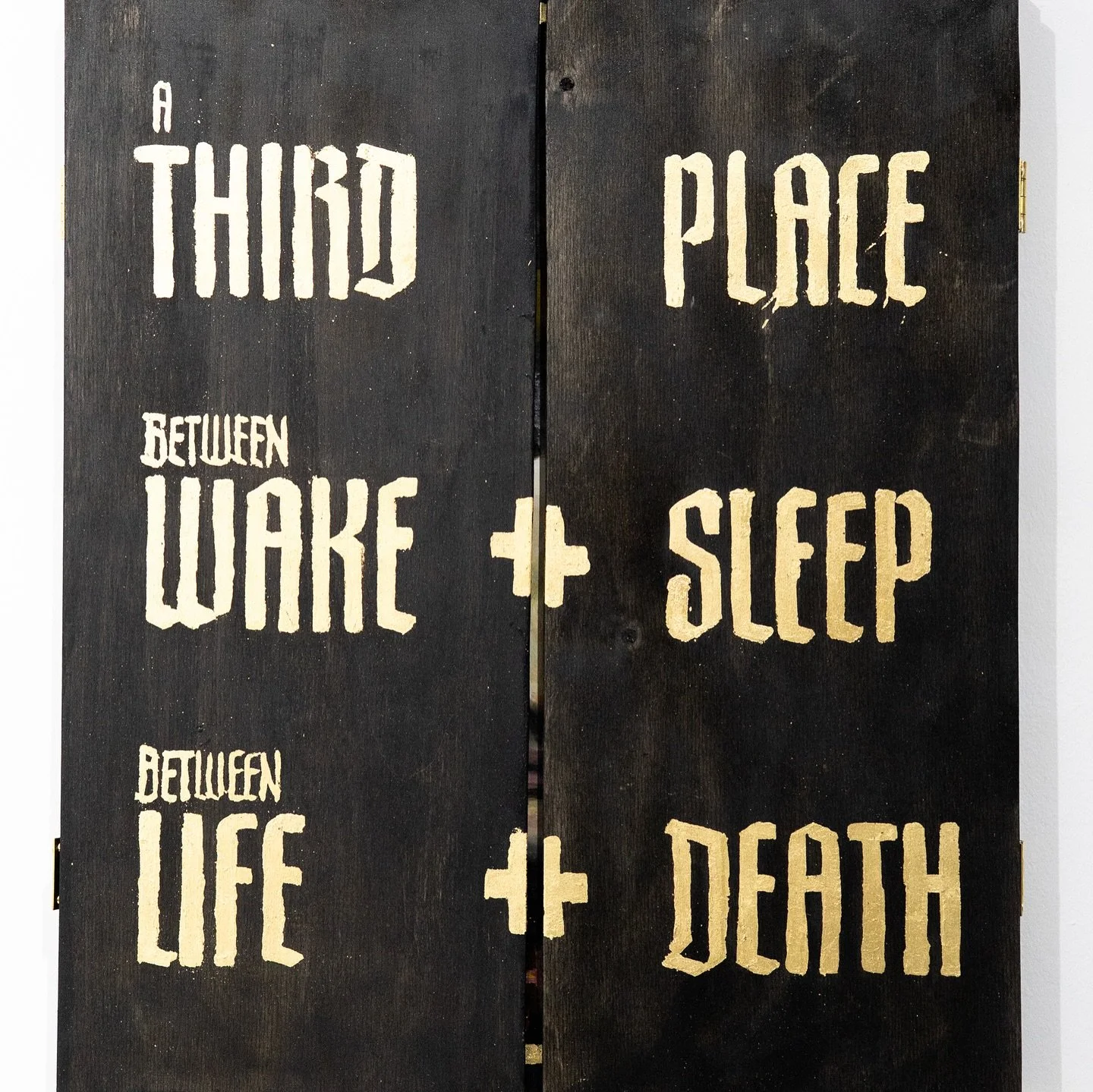 The St. Inbetween House Altar is a contemporary house shrine for temporary lives: a portable icon for the secular, the doubtful, the haunted. You light a candle before her not to ask for miracles, but to ask for endurance in the third place, where sh