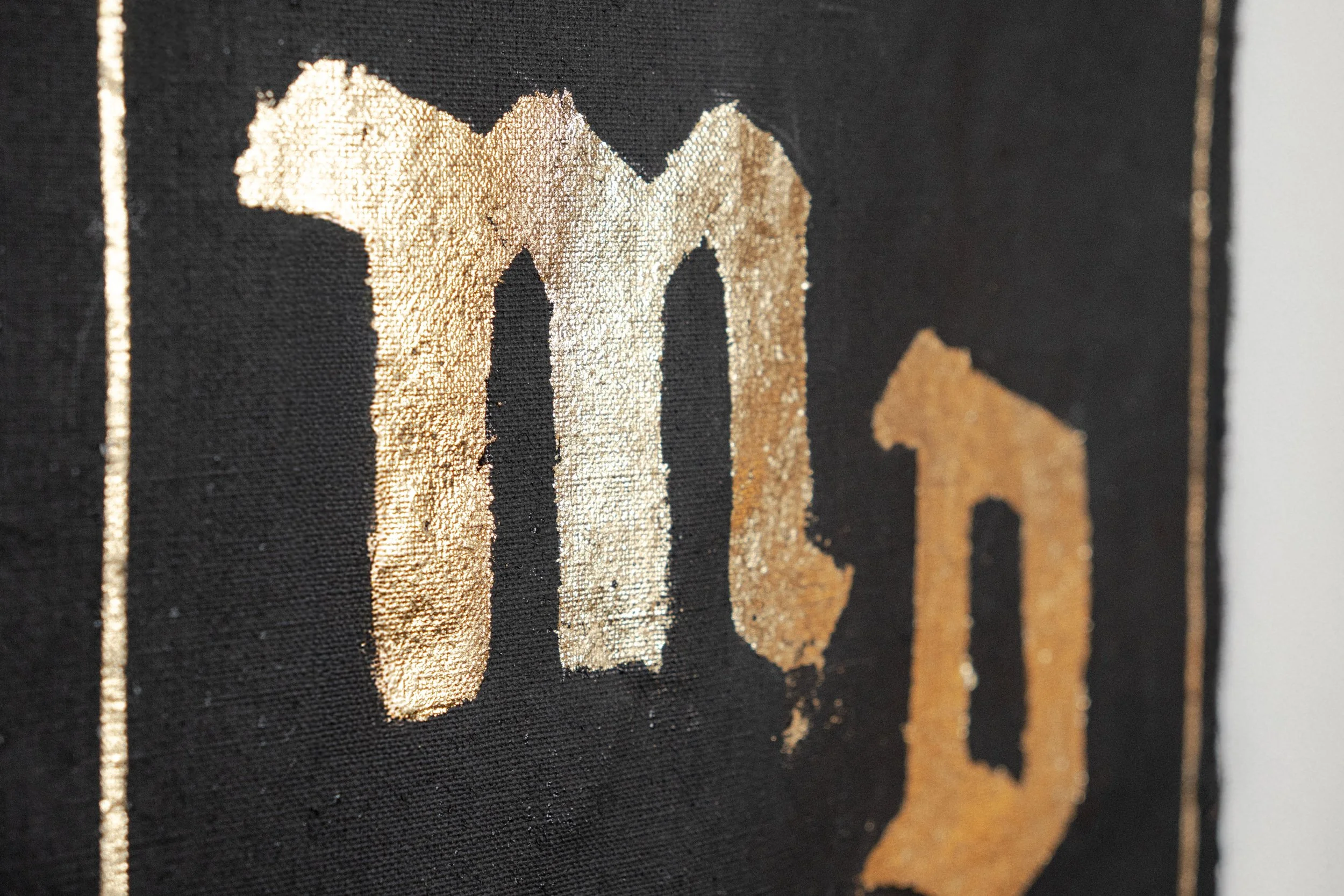 golden details on the procession Banner artwork by Maison Douce