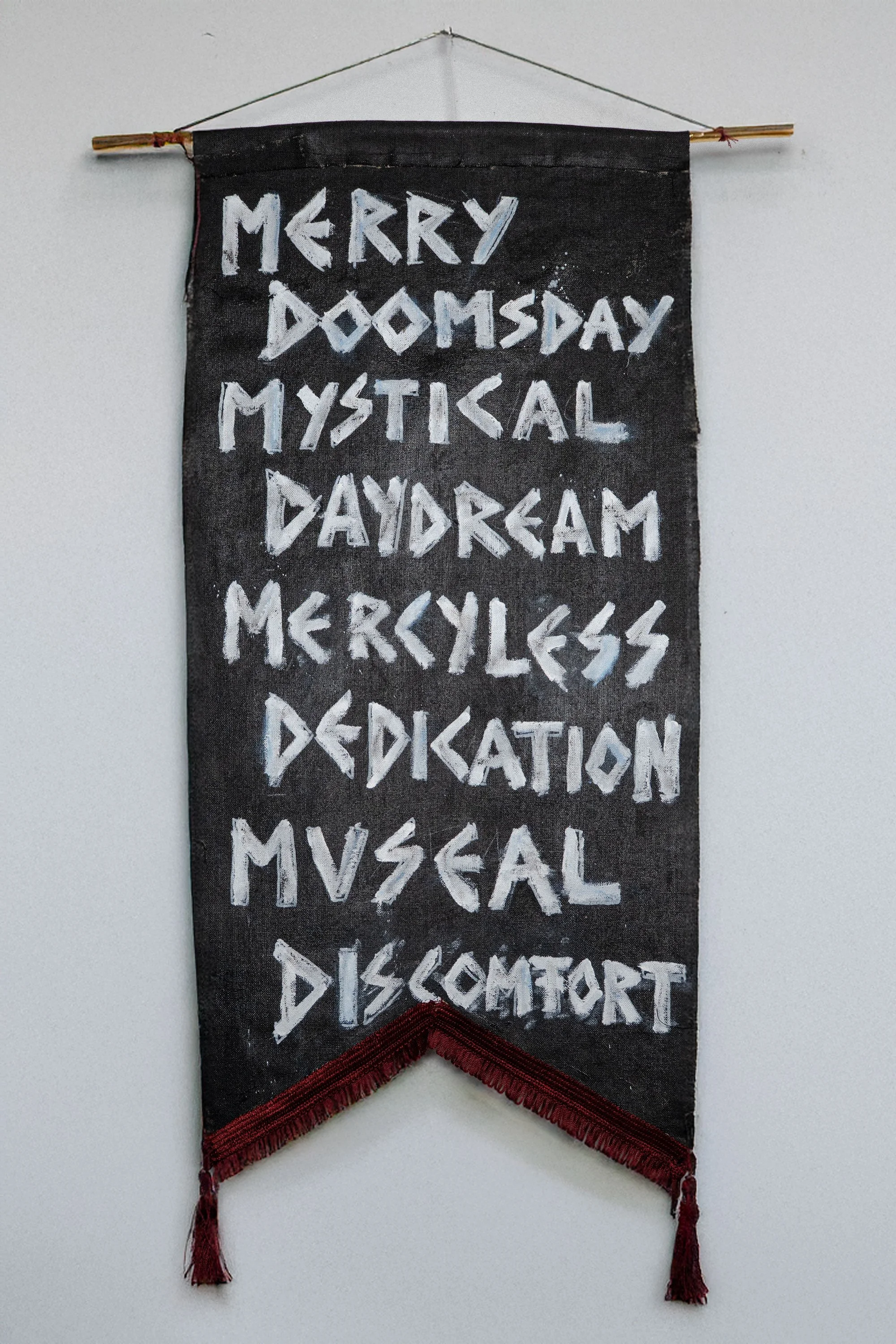 Benediction is a procession banner, with needle felted hand and leaf gold details.artwork by Maison Douce.