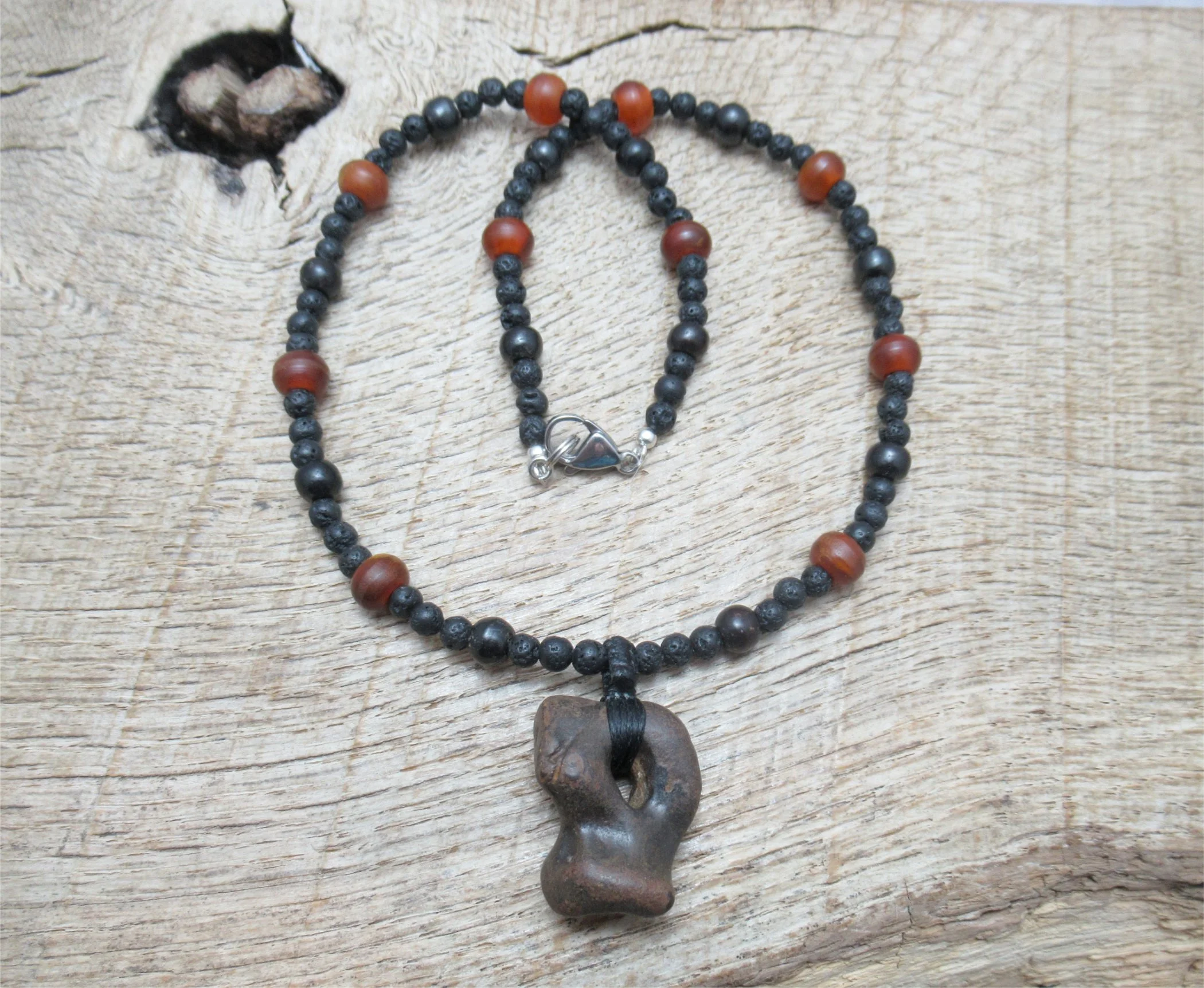 Ironstone hagstone with tiny secin hole, from the Isle of Wight, necklace with horn, dyed bone and lava stone beads FREE SHIPPING WORLDWIDE