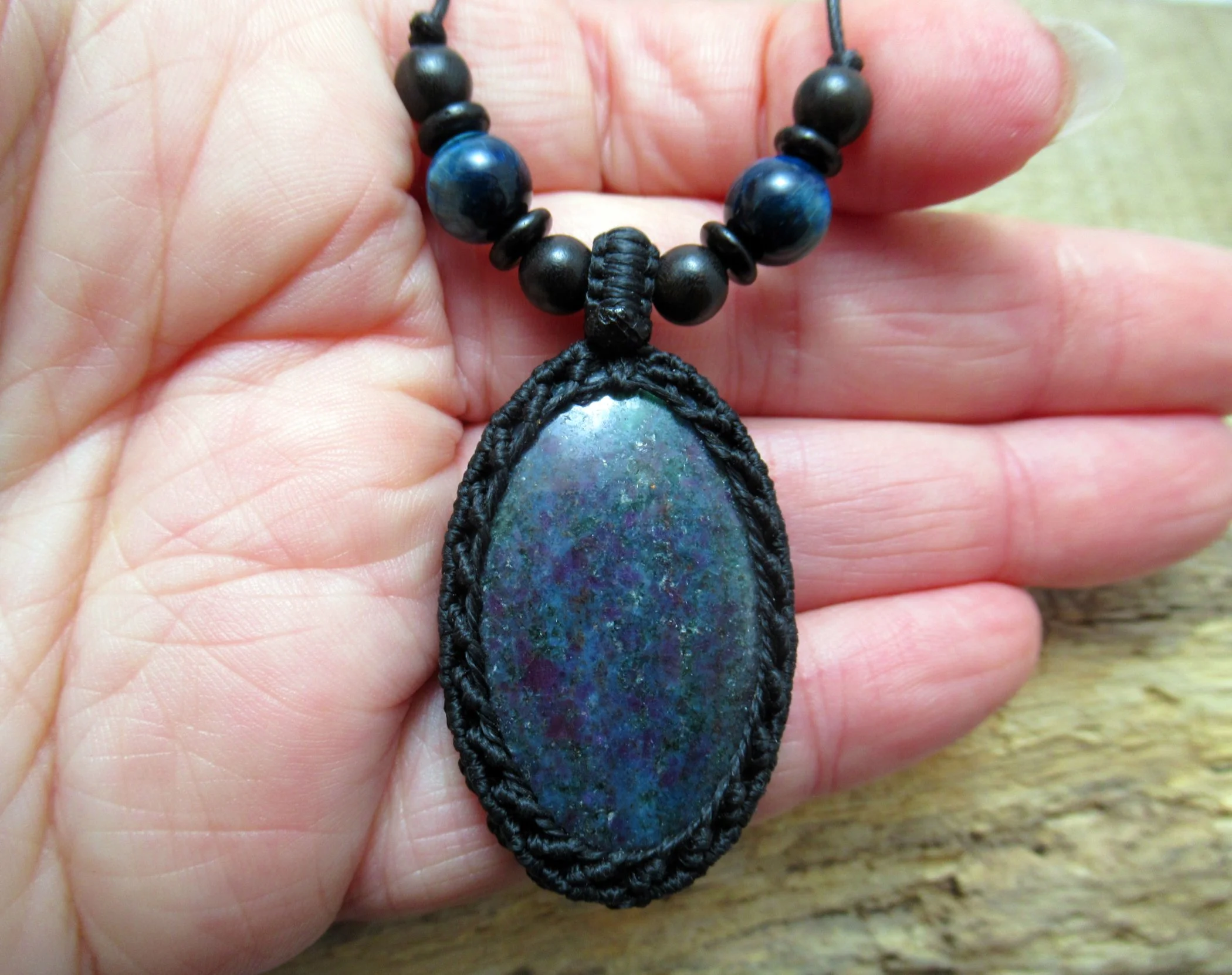 Ruby in kyanite macrame pendant, with blue tiger eye, wood and coconut shell beads