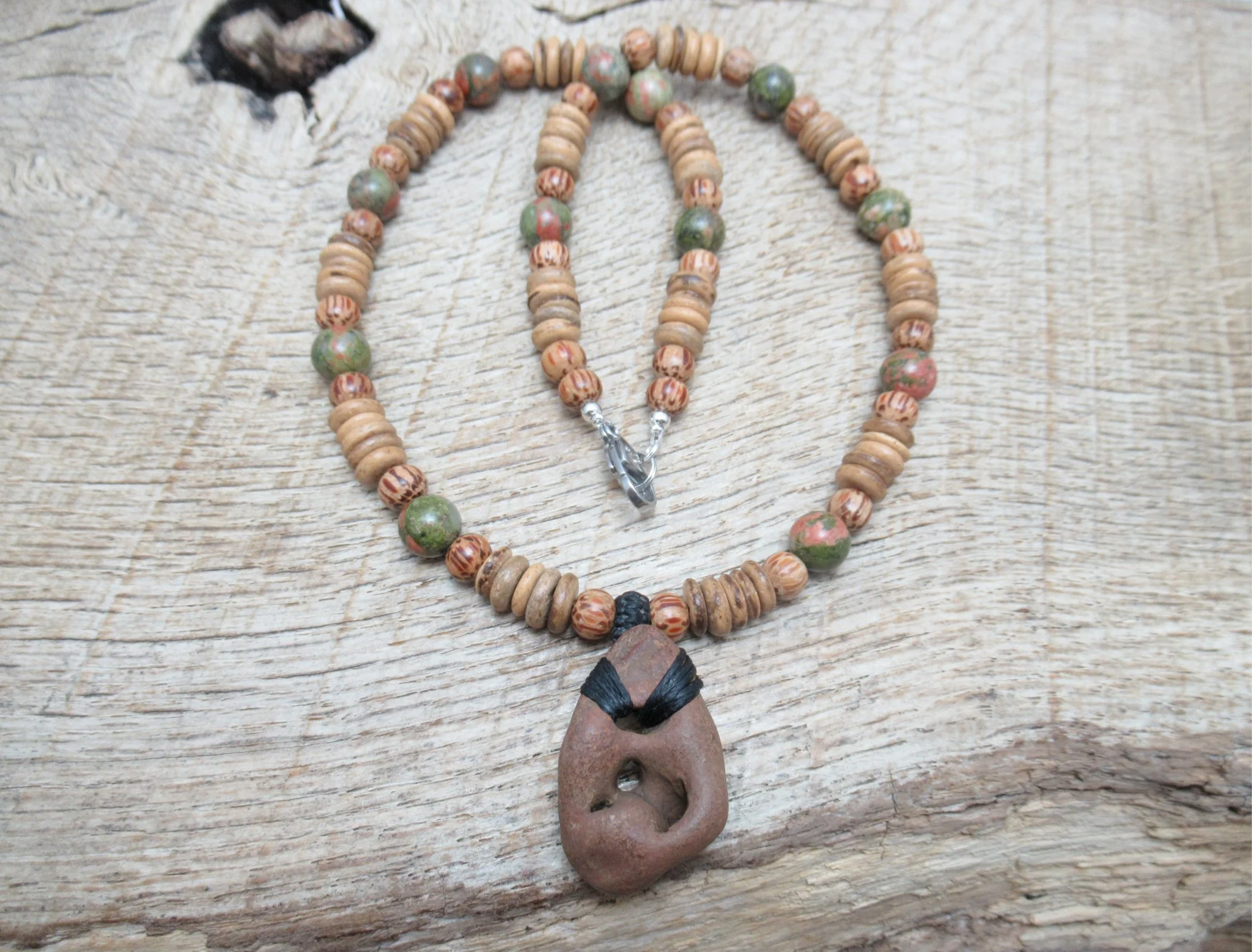 Larger ironstone hagstone with four holes on necklace with unakite, palmwood and coconut shell beads FREE SHIPPING WORLDWIDE