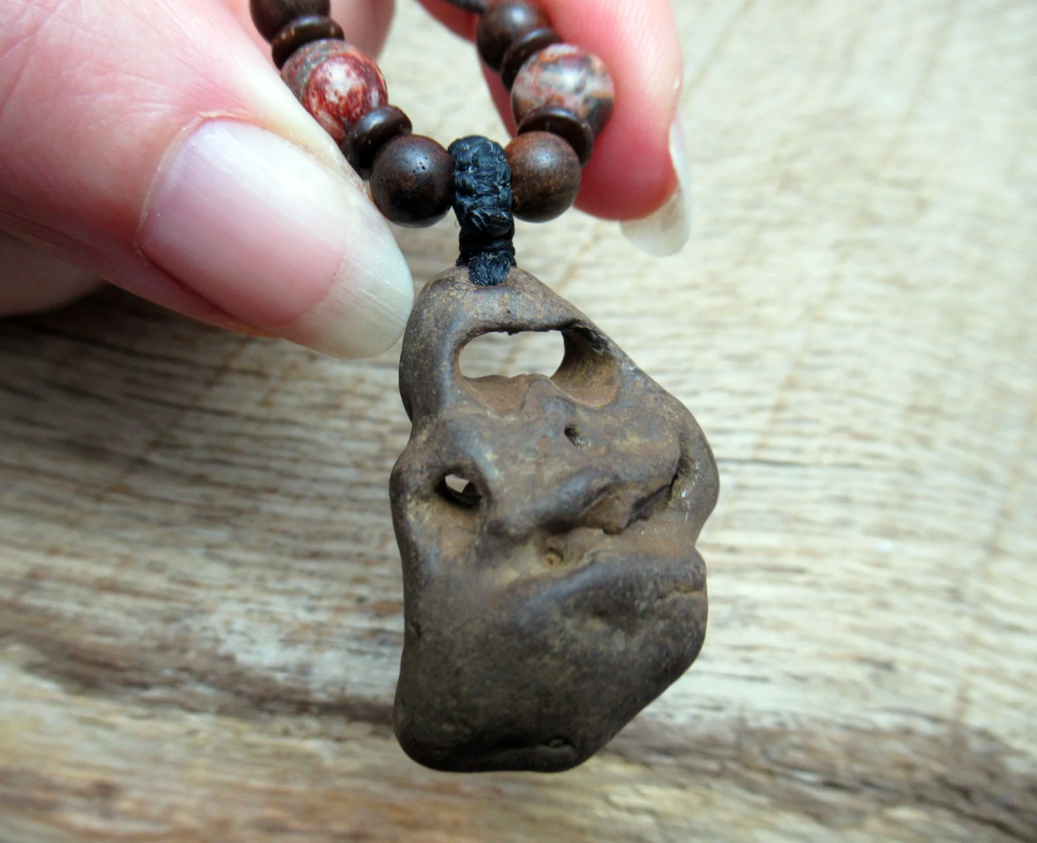 Ironstone hagstone with six holes (and a couple more tiny sneaky ones that connect inside), from the Isle of Wight coast FREE SHIPPING WORLDWIDE