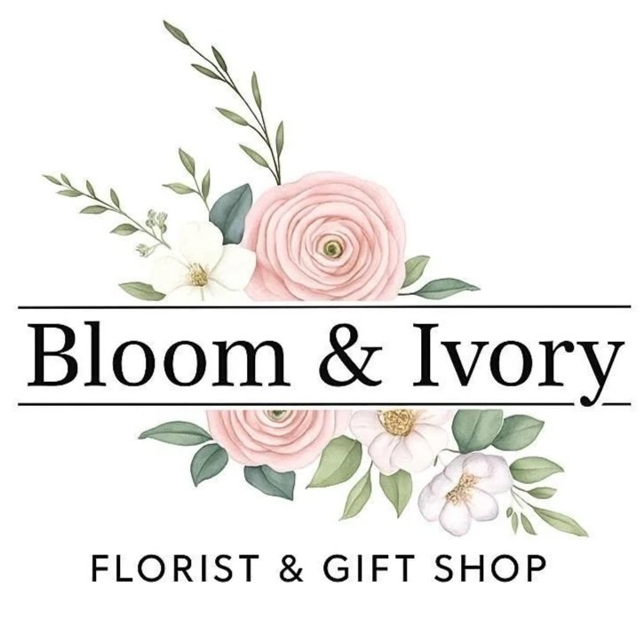 A logo for Bloom & Ivory, a florist and gift shop, featuring pink and white flowers with green leaves.