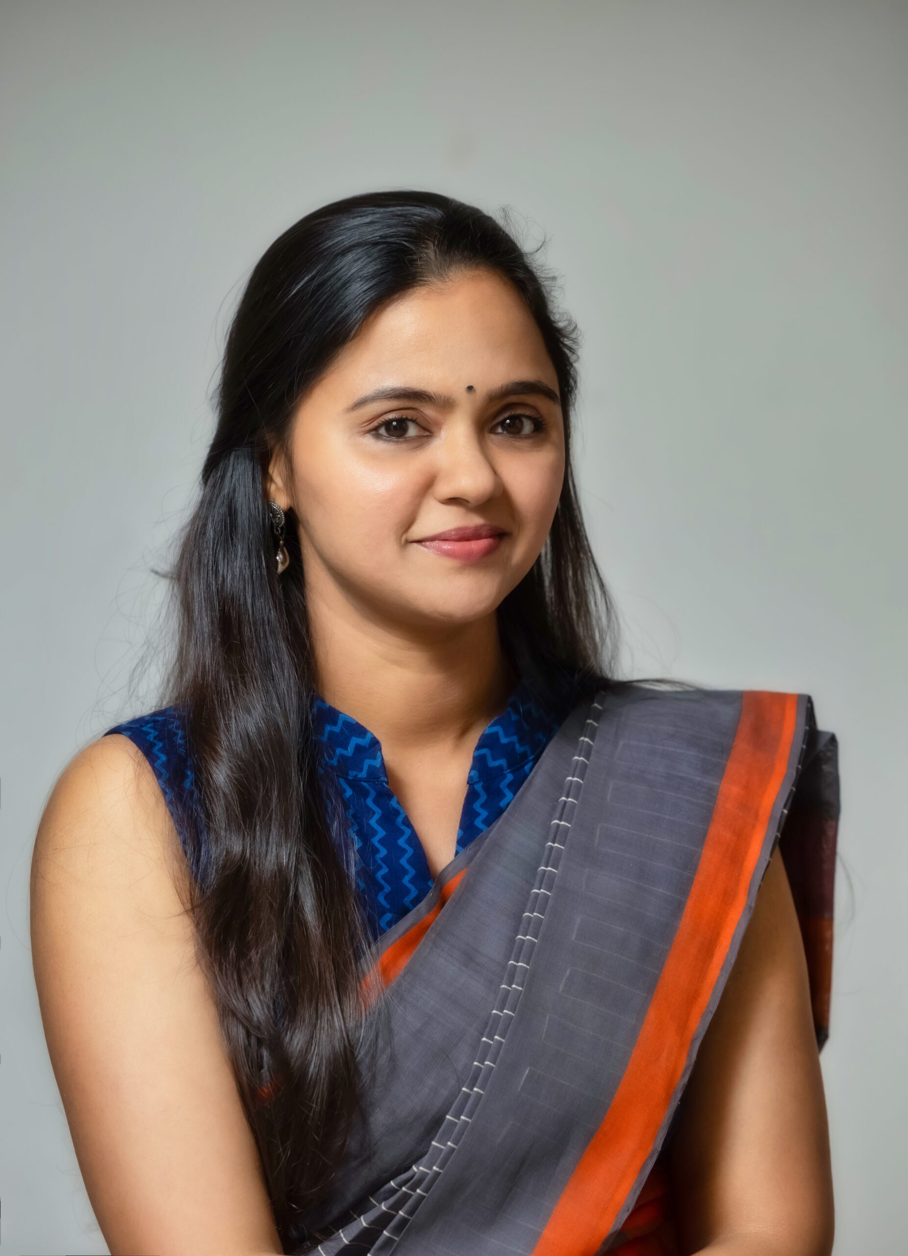 headshot-susha-scaled.jpeg