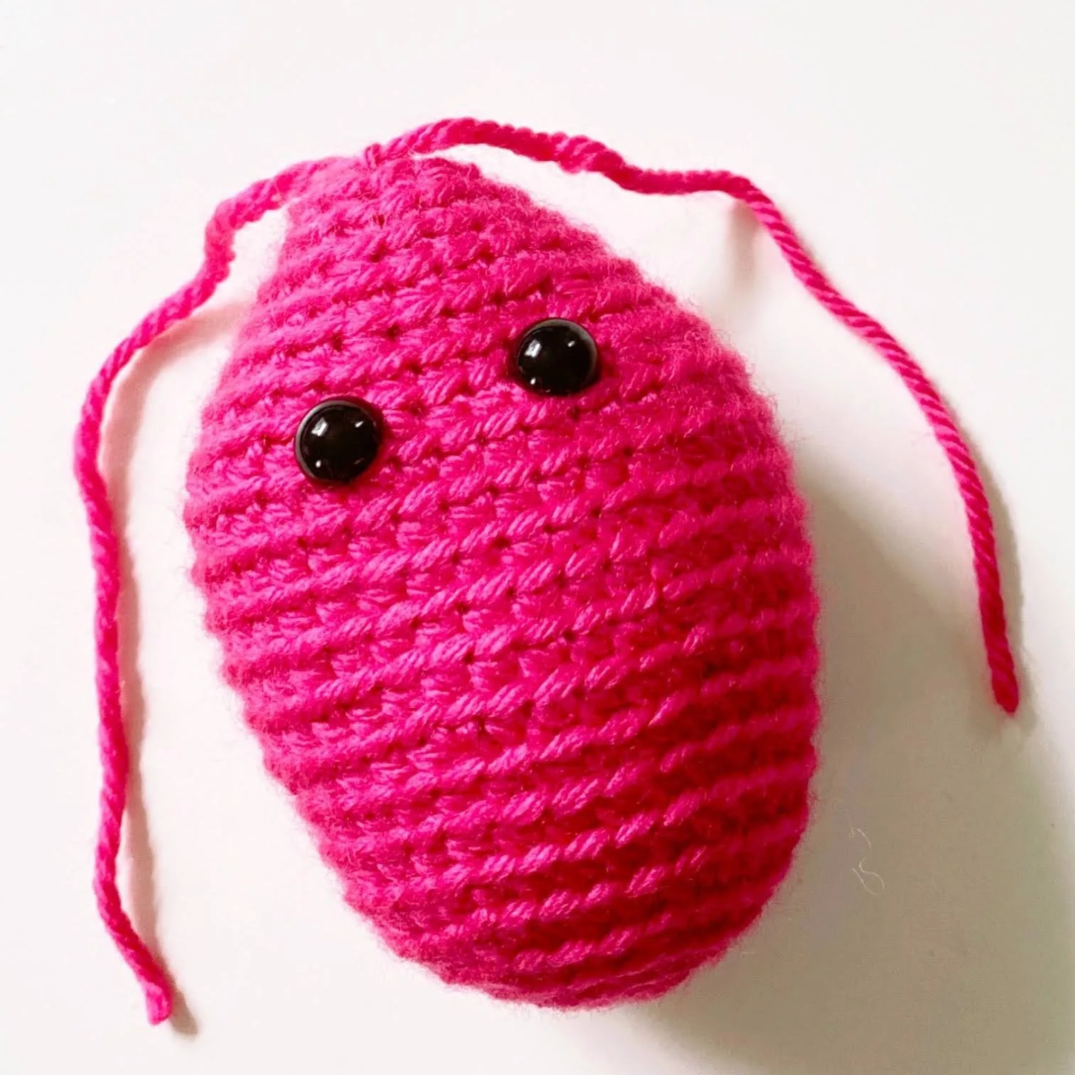 Pink Dunaliella Salina crochet microbe with black eyes