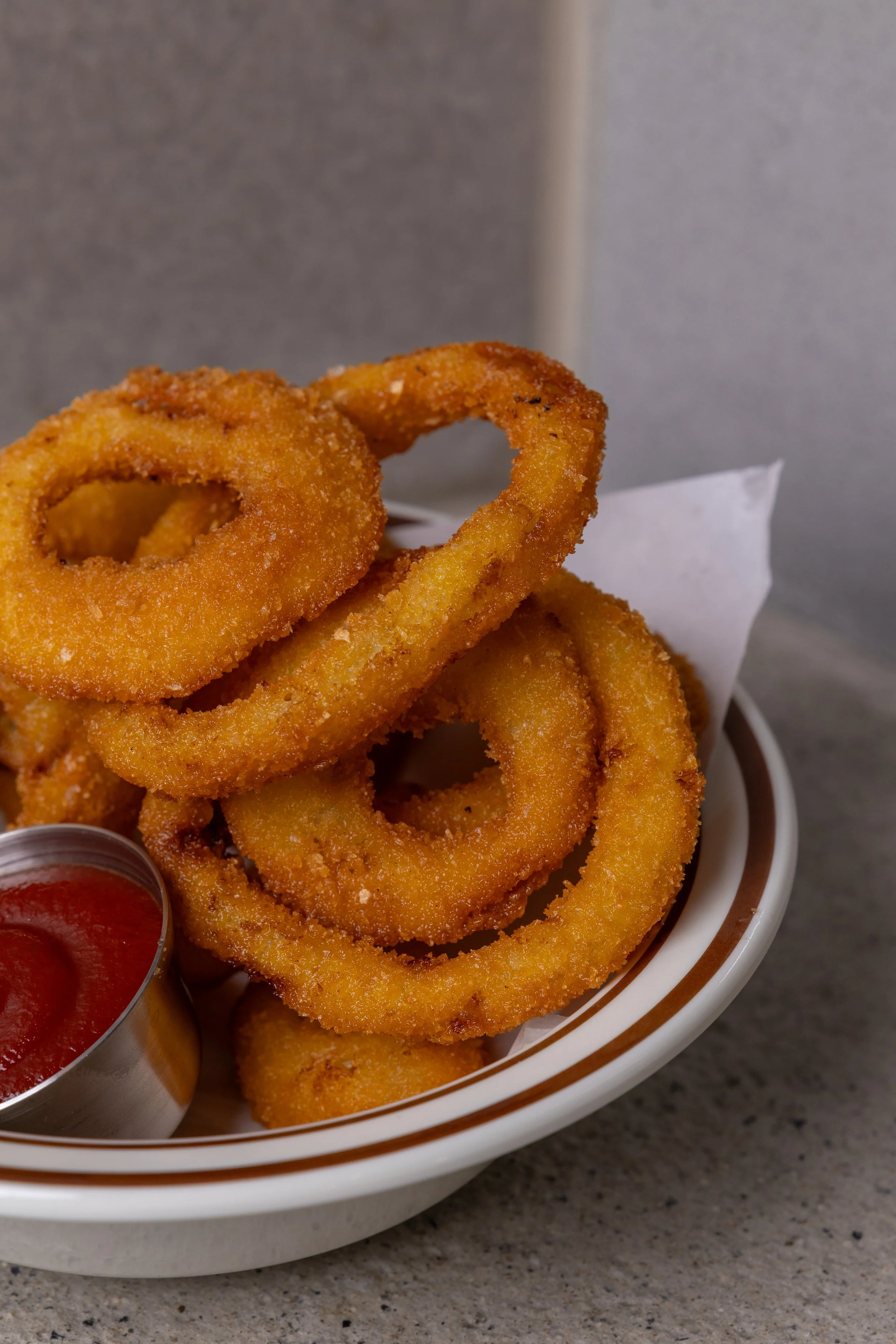 Stan Lee commercial food photography onion rings and steak fries