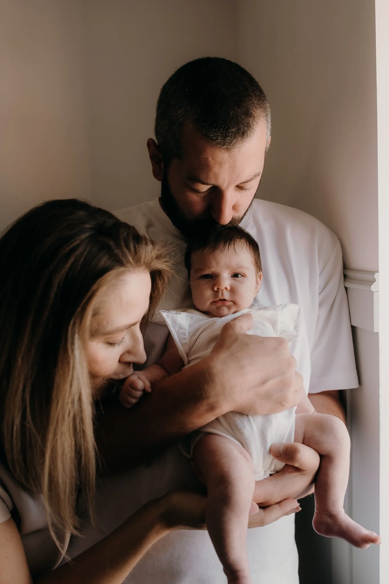 newborn with parents.jpg