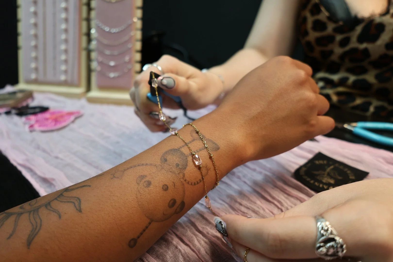 Permanent jewelry bracelet being custom-fitted and welded for a seamless, clasp-free finish