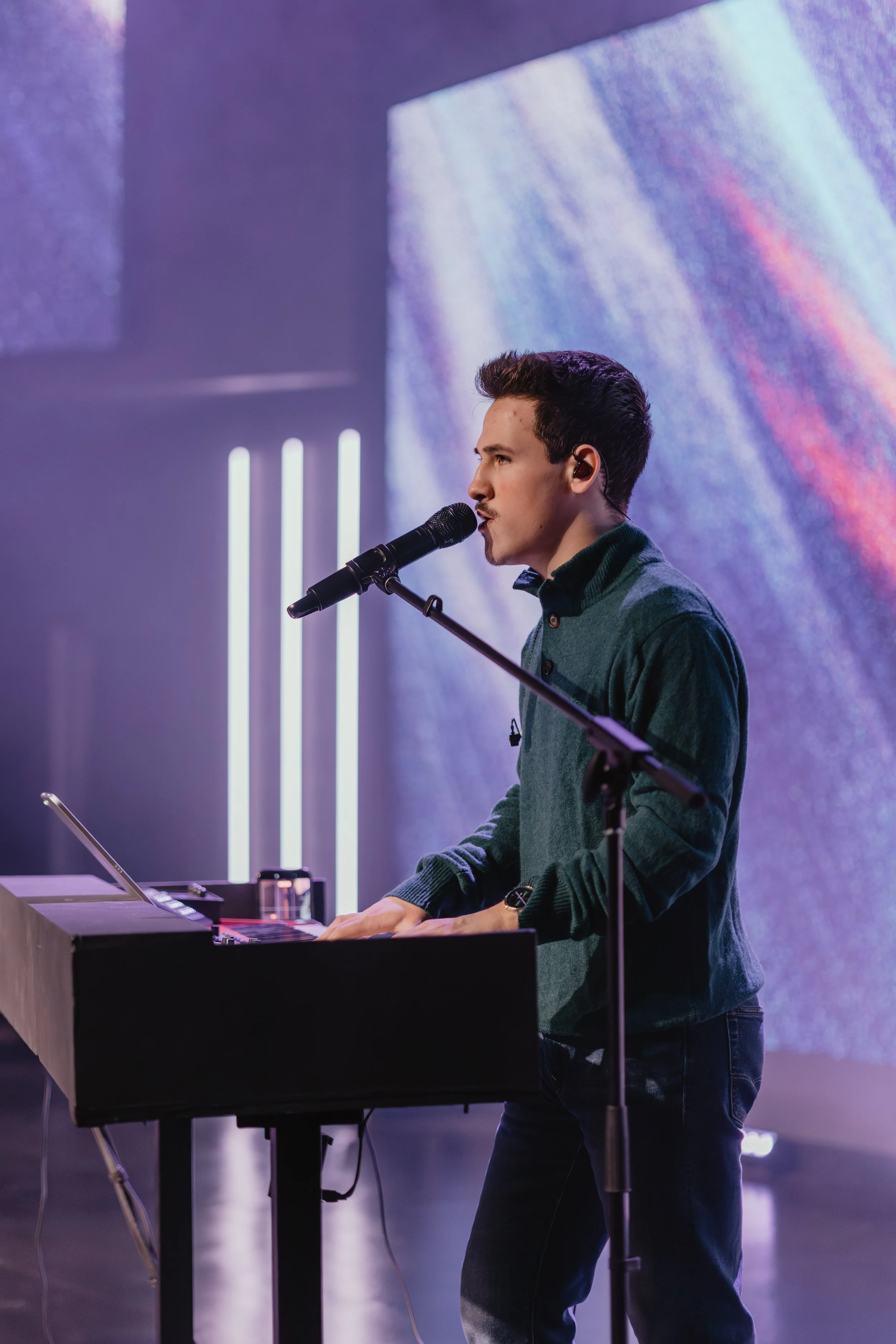 photo of carson playing the keys