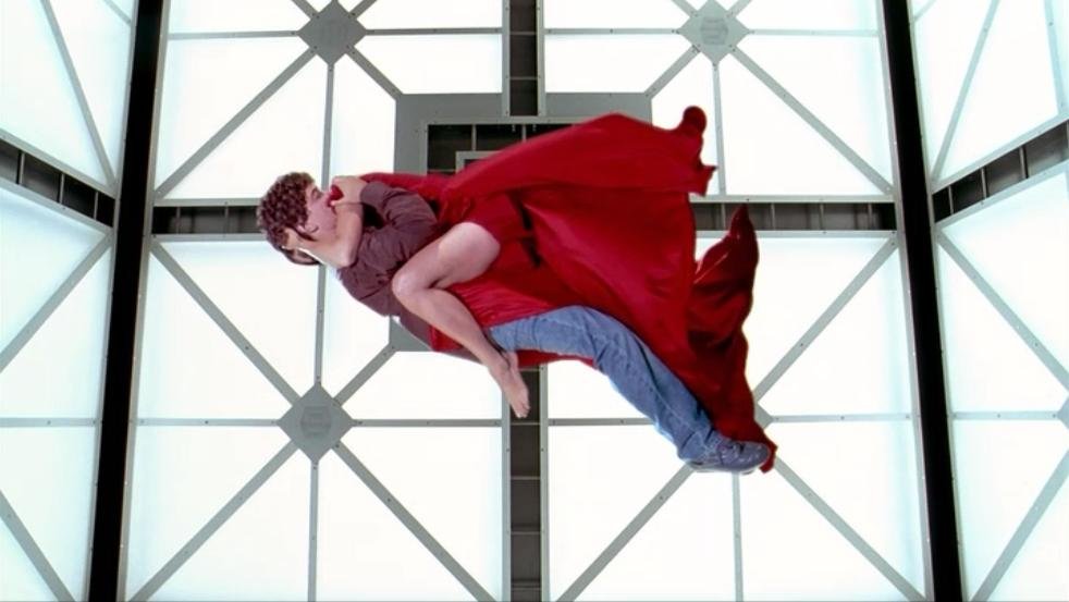 From Cube 2: Hypercube, a man and a woman embrace as they float in a white room