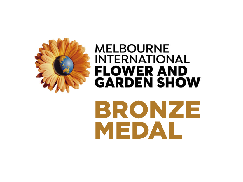 Melbourne International Flower and Garden Show logo with a sunflower and a globe, and text indicating a bronze medal award.