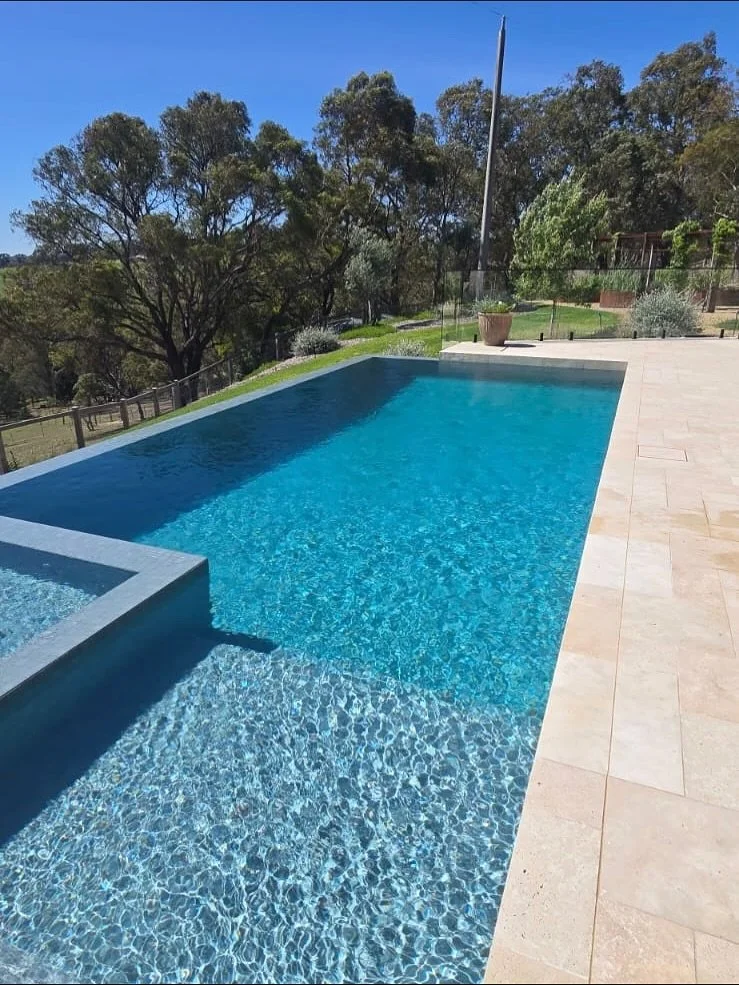 We&rsquo;ll leave the professional shots to @marniehawson but we couldn&rsquo;t resist sharing a few behind-the-scenes moments from shoot day at our Kangaroo Ground project.

A pool that captures the sunshine and the view and is just as good in real 