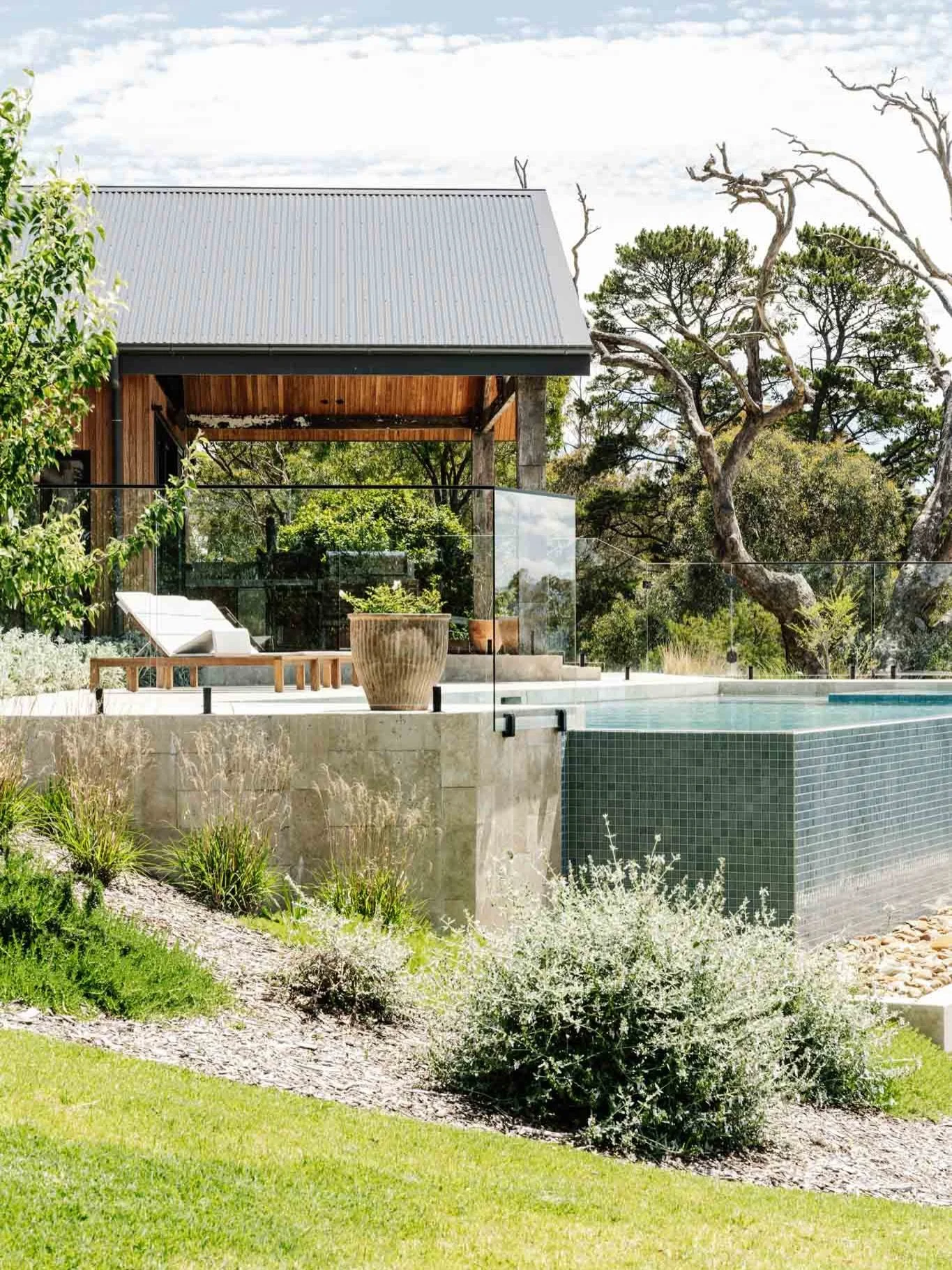 Perched high on the rolling hills of Kangaroo Ground, this pool was designed to work with the landscape rather than compete with it. The brief called for something restrained, site-responsive and timeless. A pool that felt anchored to its rural setti