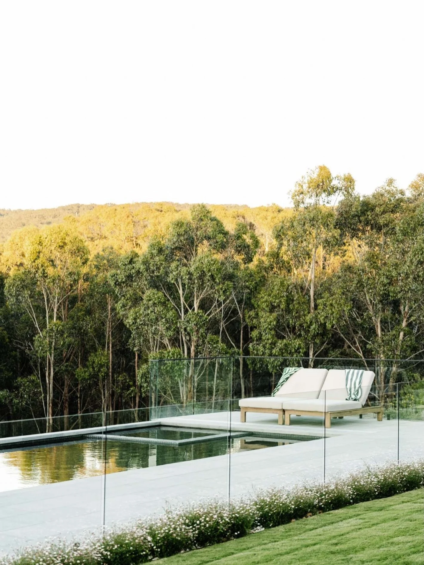A pool can be many things. Sculptural, functional, architectural - but in settings like New Gisborne, it becomes something quieter.

A moment to rest.

This elevated waterline reflects the bushland and sky, sitting softly above a garden that drifts i