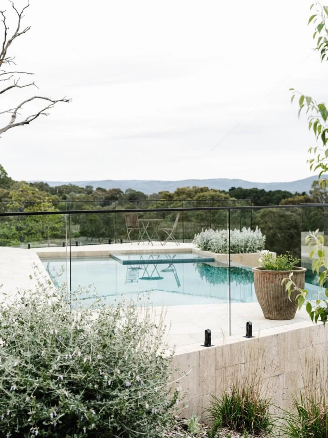 Moments of reflection, where the landscape meets the water.

📍 Kangaroo Ground

Home by @sanctumhomes 
Interior design @hehedesign 
Pool &amp; landscape @tlc_pools
Pool tiles by @thepooltilecompany 
Photography @marniehawson