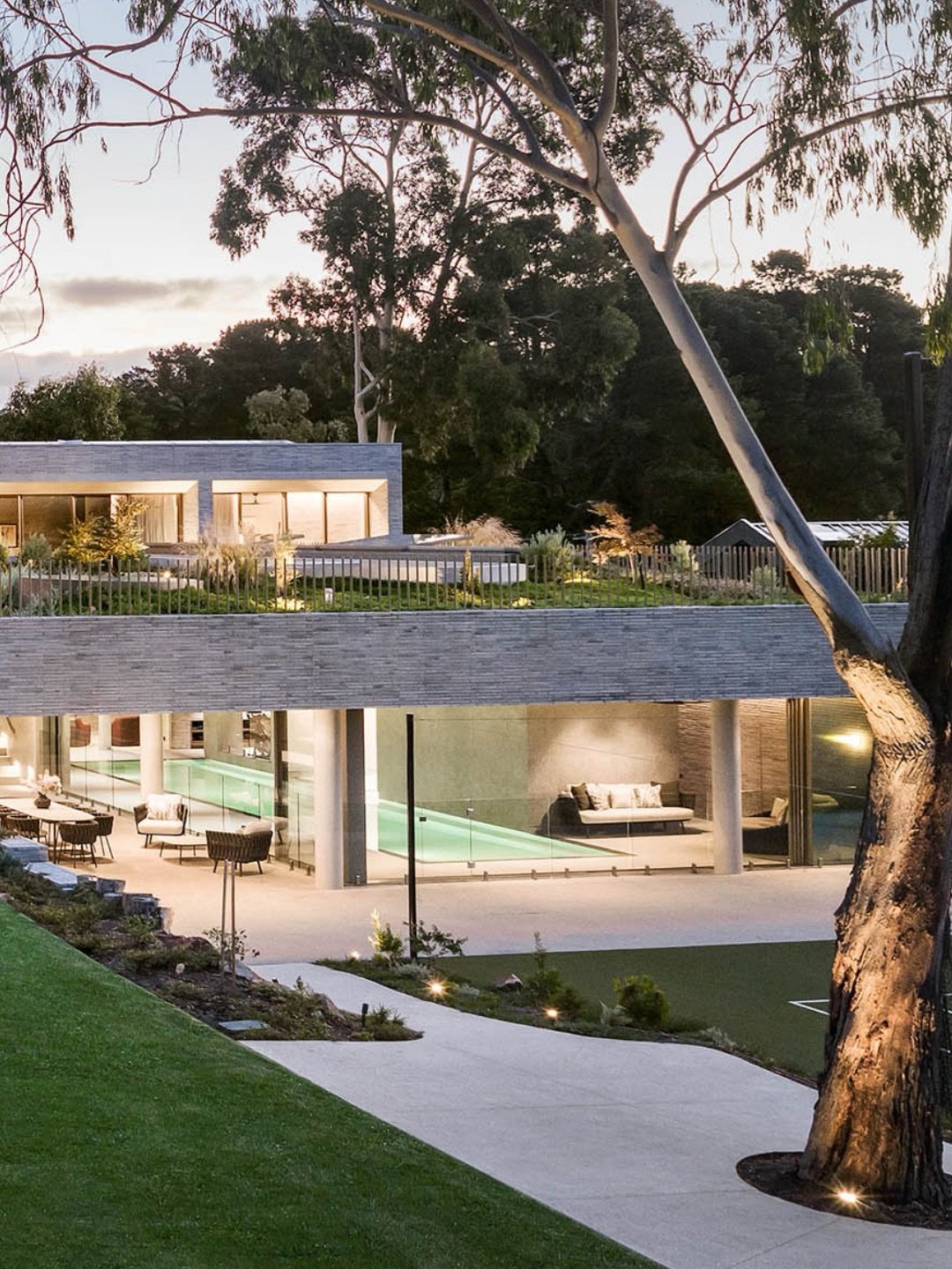 Most of what makes this pool work is invisible.

The waterline sitting seamlessly across the wet deck is supported by a concealed 20,000-litre balance tank below. Without that hidden volume, the surface simply wouldn&rsquo;t read as one continuous pl