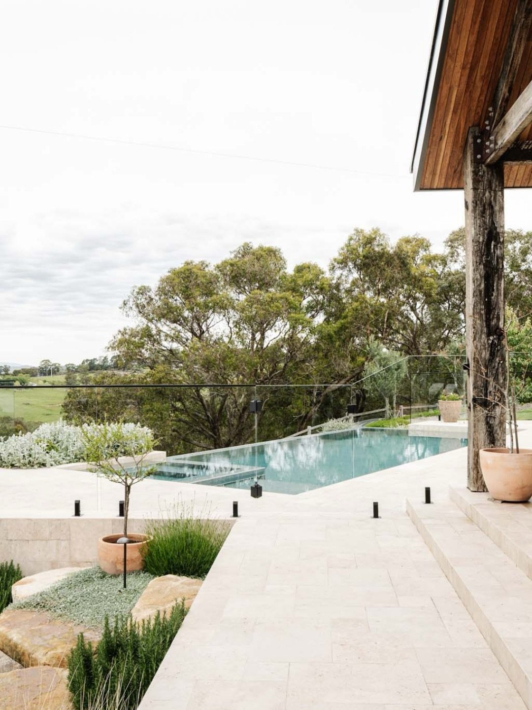 When your views look like this, it makes sense to spend as much time outdoors as possible.

At our Kangaroo Ground project, the pool was positioned to open directly to the landscape, with a negative edge that draws the eye out across the valley.

A p