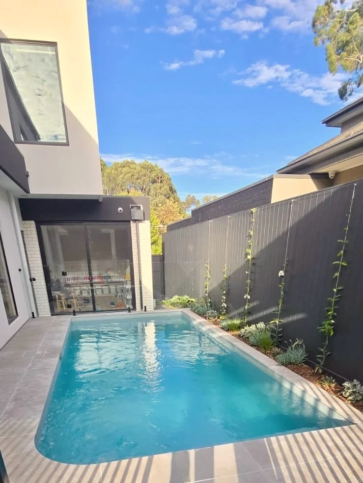 Not every great pool needs a big footprint.

This one proves the point. Tucked neatly alongside the home, it turns a narrow run of space into something you actually want to spend time in.

Long enough to swim. Close enough to connect to the house. An
