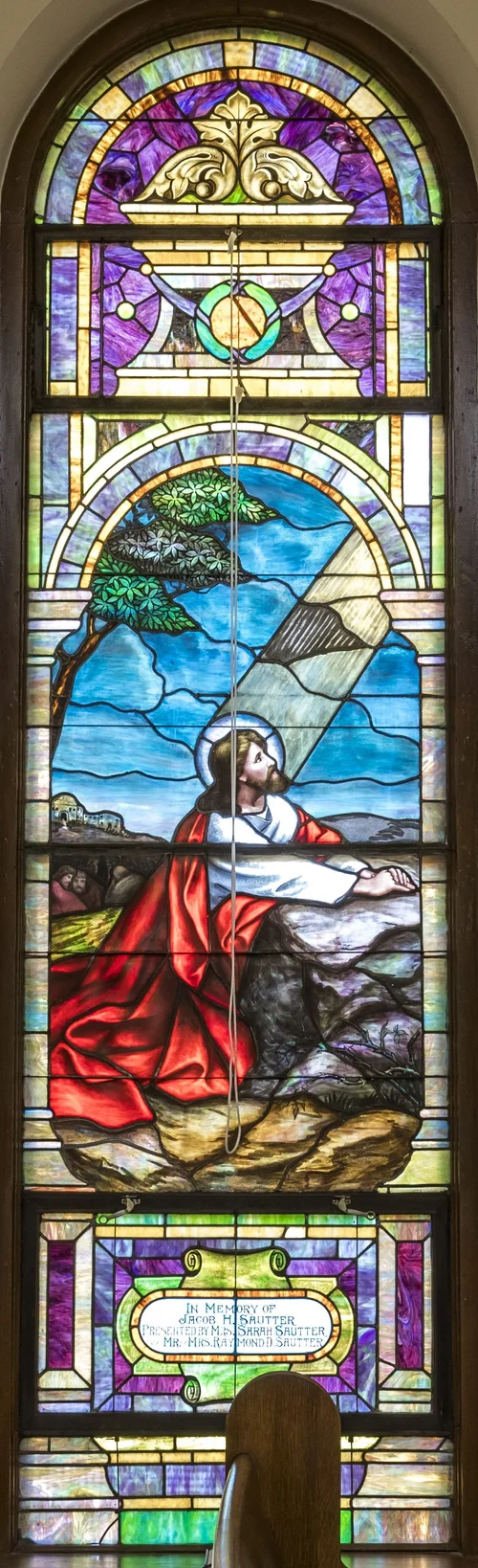 A stained glass window in the sanctuary