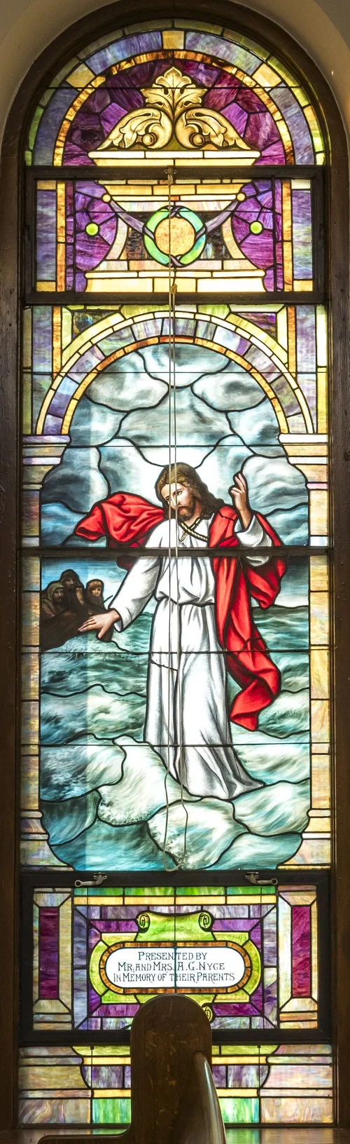 A stained glass window in the sanctuary