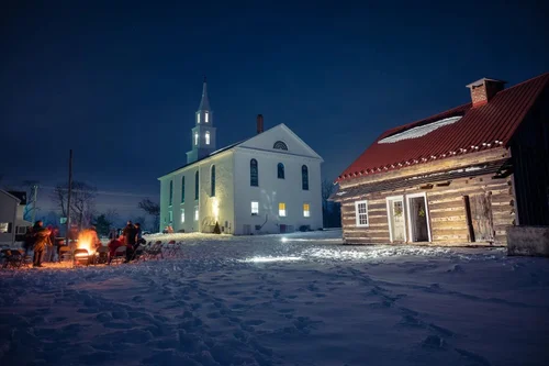 The church and the Gemeinhaus on a winter evening