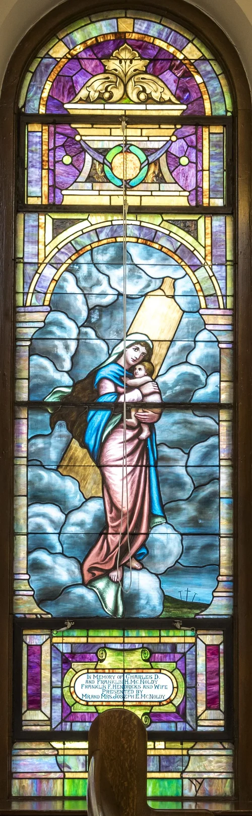 A stained glass window in the sanctuary