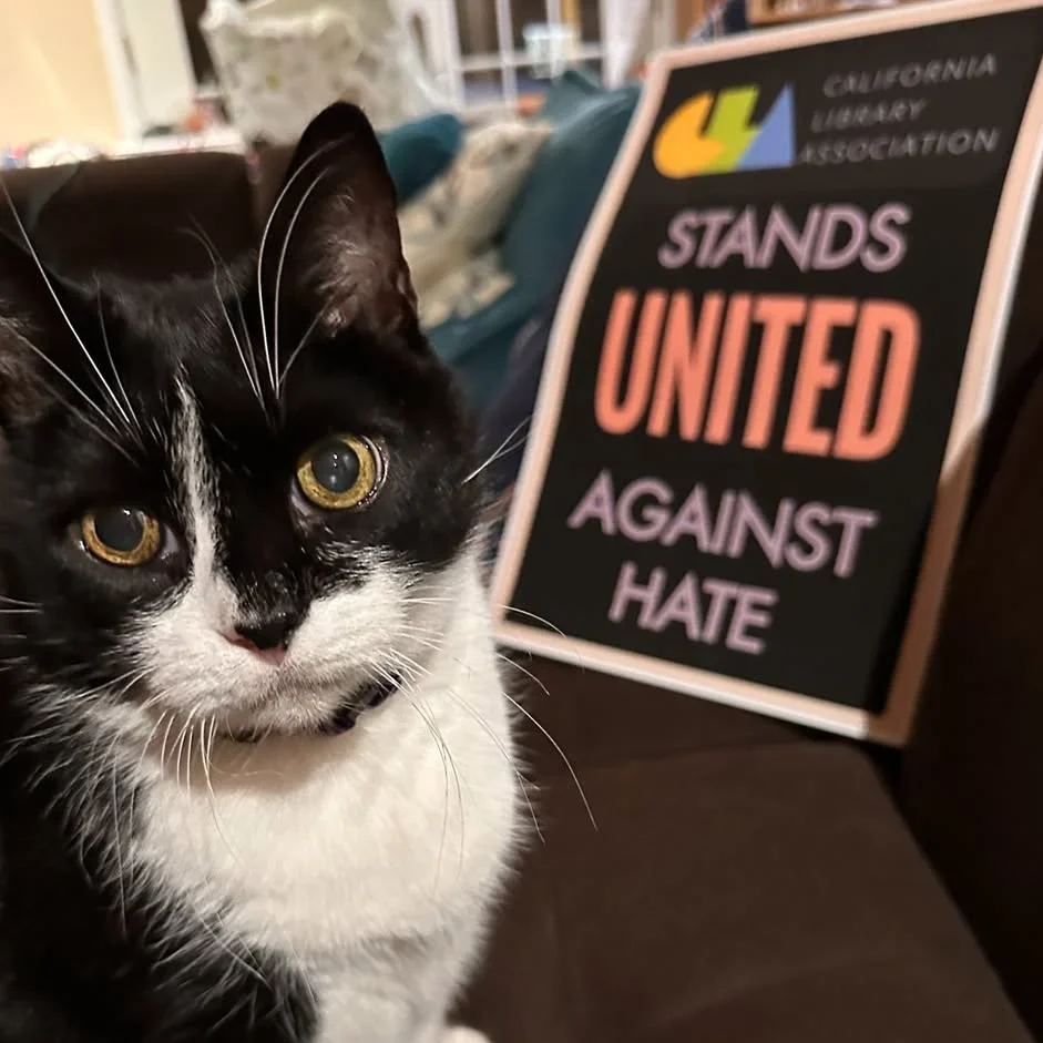 California Library Association Stands United Against Hate, and their cat, Lucy